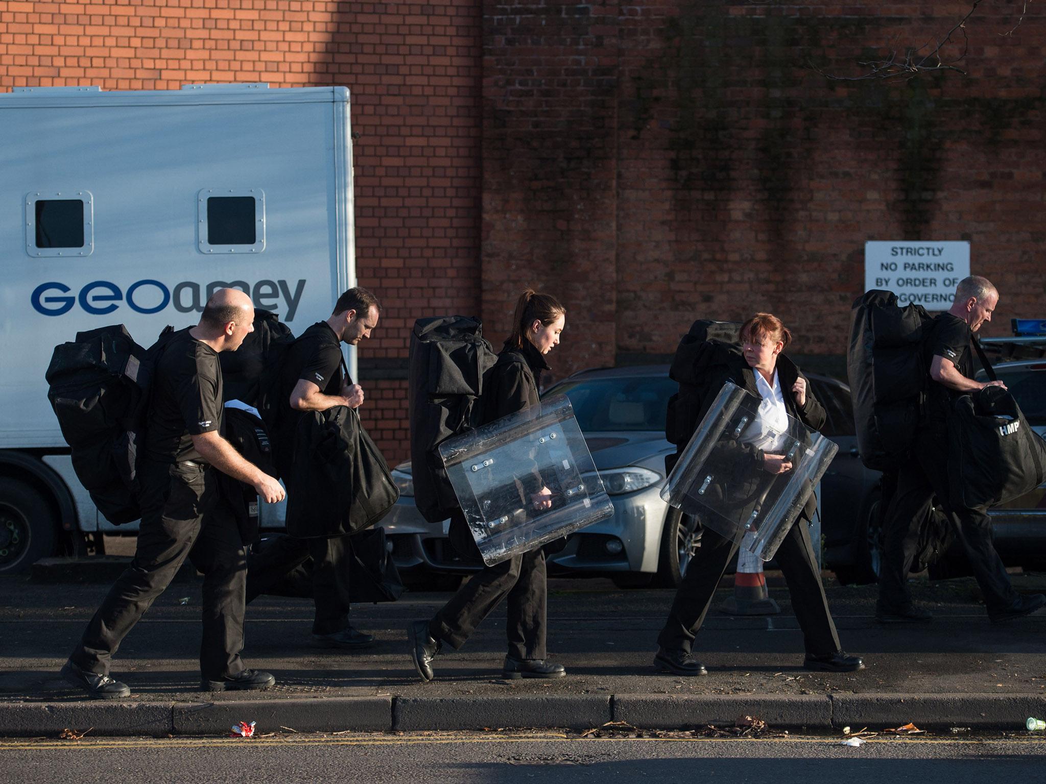 Prison staff leaving HMP Birmingham today. Riot police regained control of the jail late last night