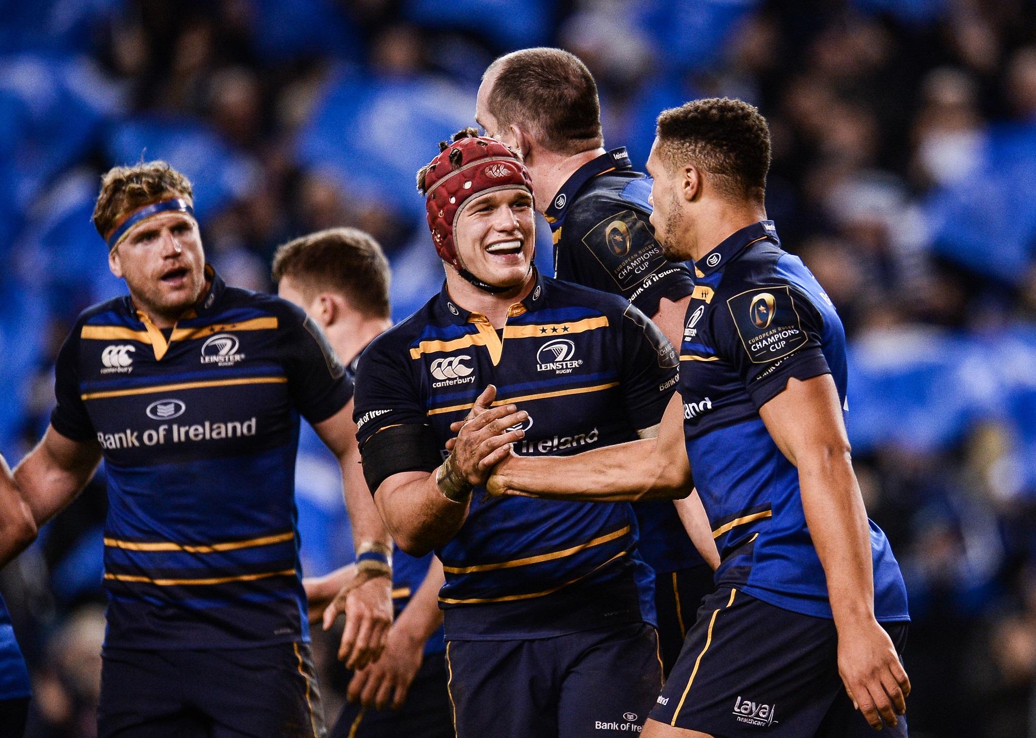 Adam Byrne is congratulated by Josh van der Flier after scoring Leinster's third tryagainst Northampton Saints