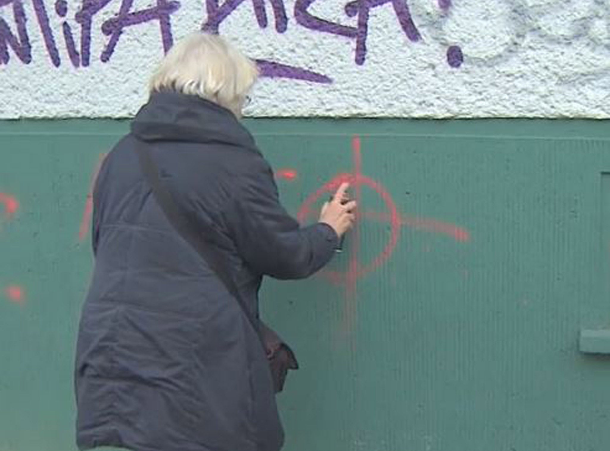 Irmela Schramm has been covering racist graffiti for the last thirty years