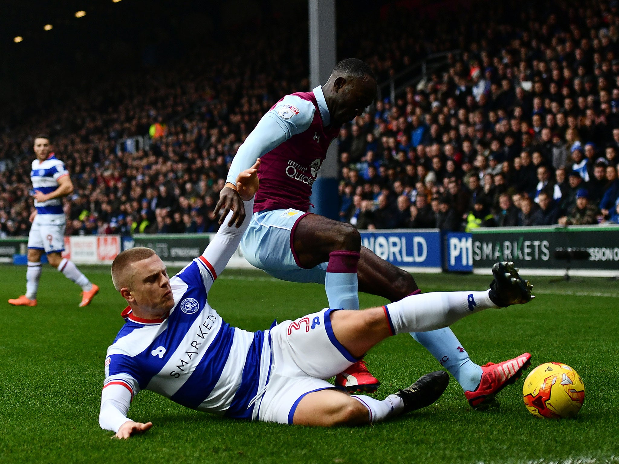 Jake Bidwell puts in a challenge on Albert Adomah