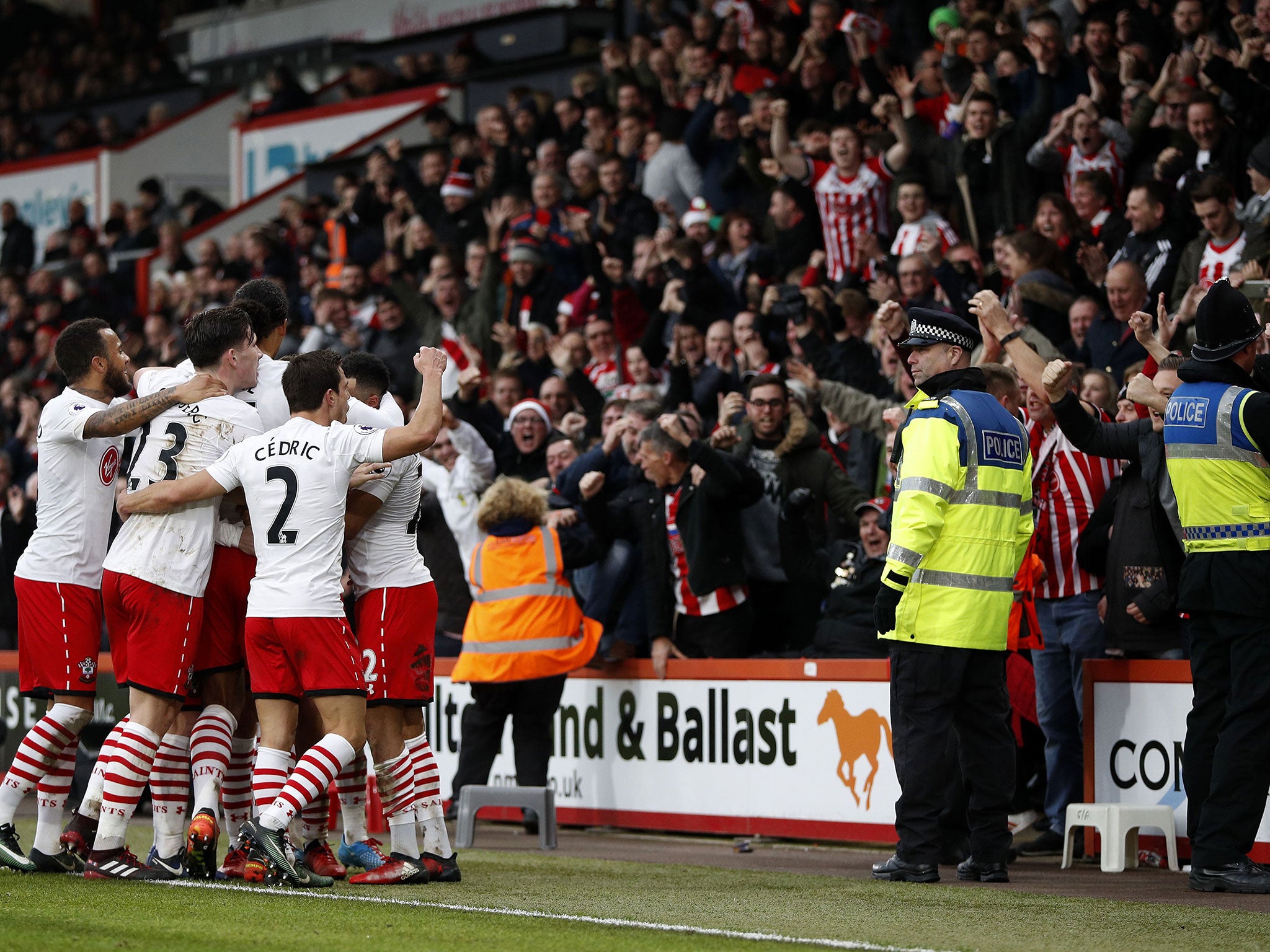 Southampton's players celebrate with fans following Rodriguez's second goal