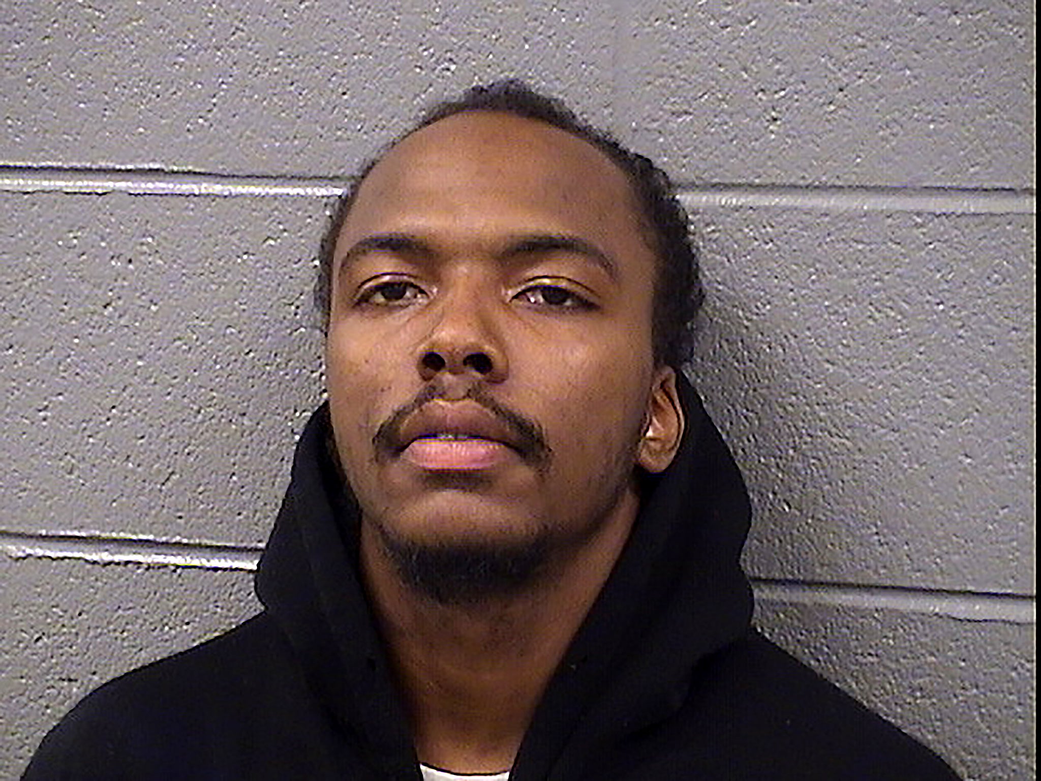 Dwright Boone-Doty is seen in a booking photo from the Cook County Jail, in Illinois5. Boone-Doty, 22, was charged on Monday with killing 9-year-old Tyshawn Lee who was lured from a park into an alley and shot several times in what authorities said was gang-related retaliation targeted at his father