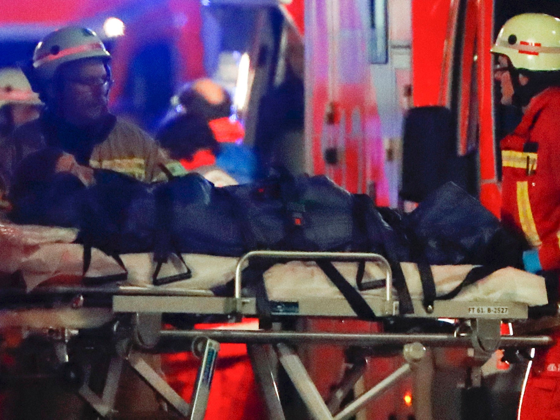 Damaged stalls at the scene of the incident at a Berlin Christmas market where at least 12 people have been killed