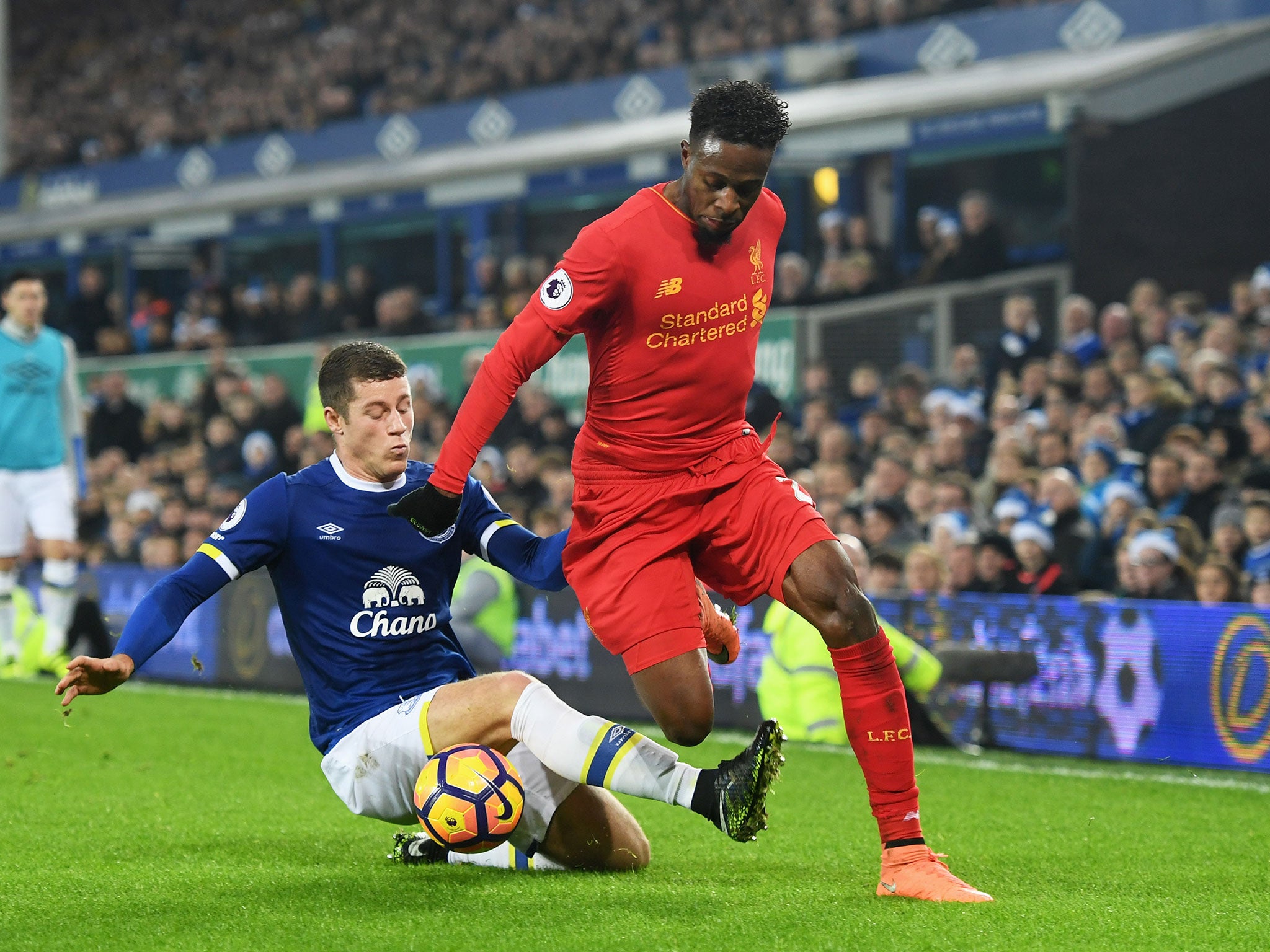 Ross Barkley looks to dispossess Divock Origi