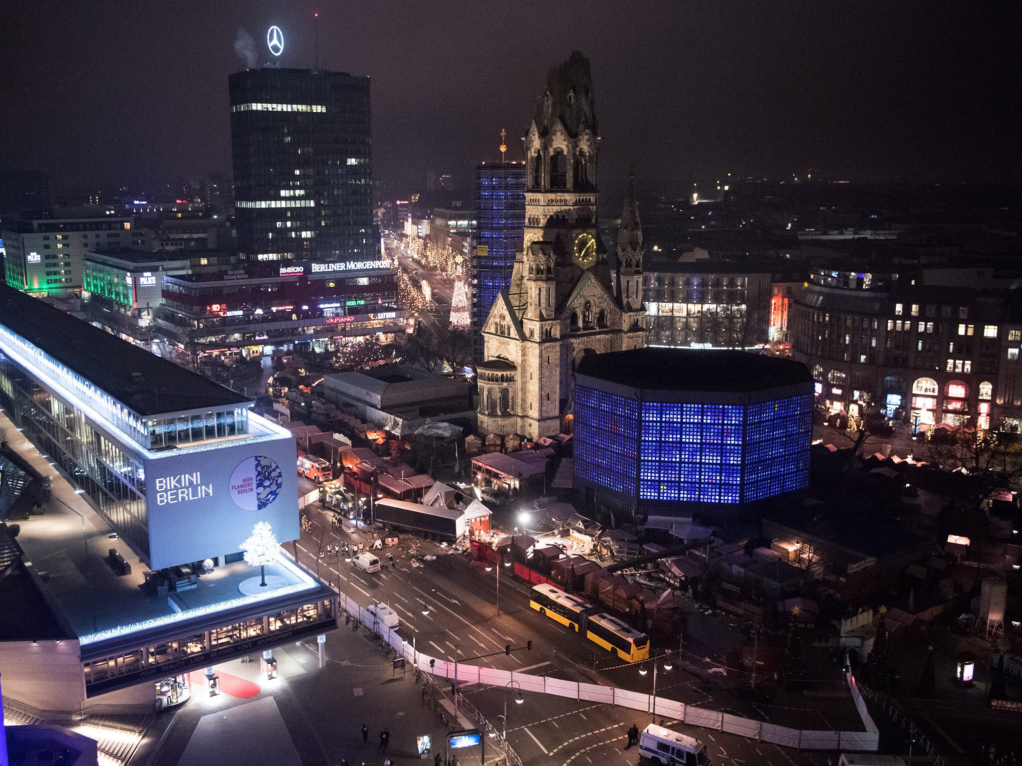 The extent of the damage at the scene where a truck crashed into a Christmas market close to the Kaiser Wilhelm Memorial Church, in Berlin, Germany