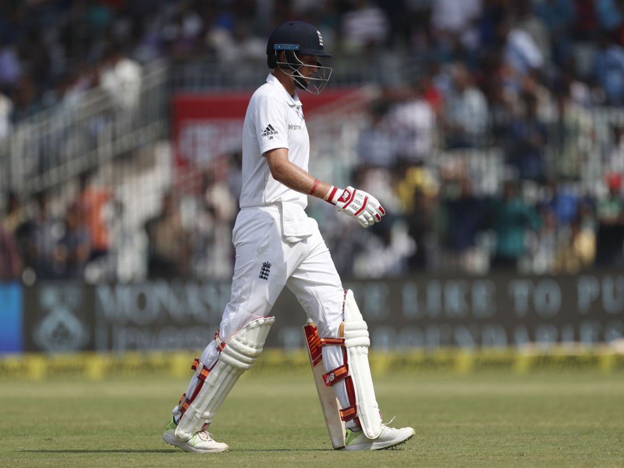 Joe Root walks off the field after being dismissed for 6