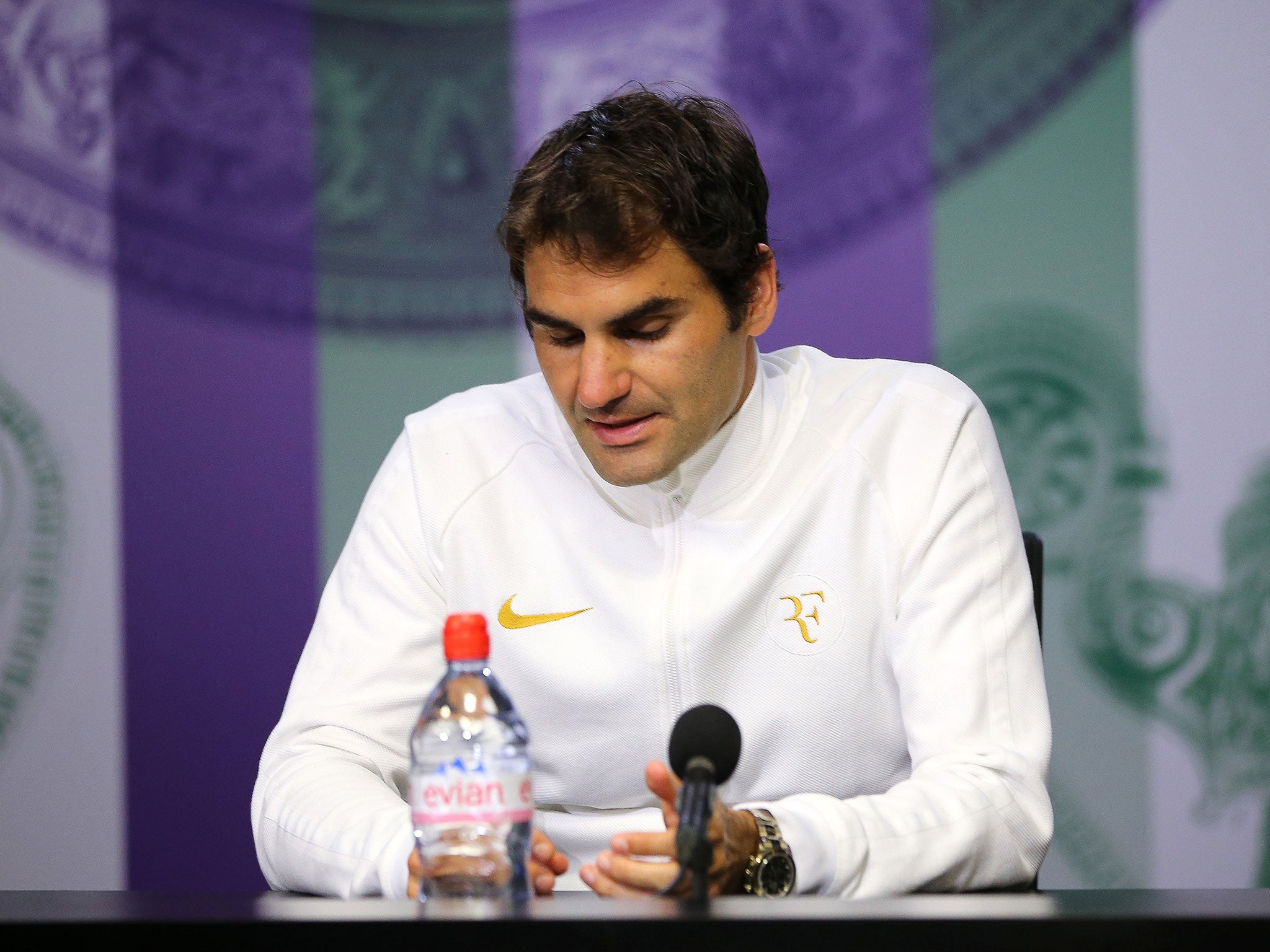 Federer was forced to take time out after injuring his knee at Wimbledon