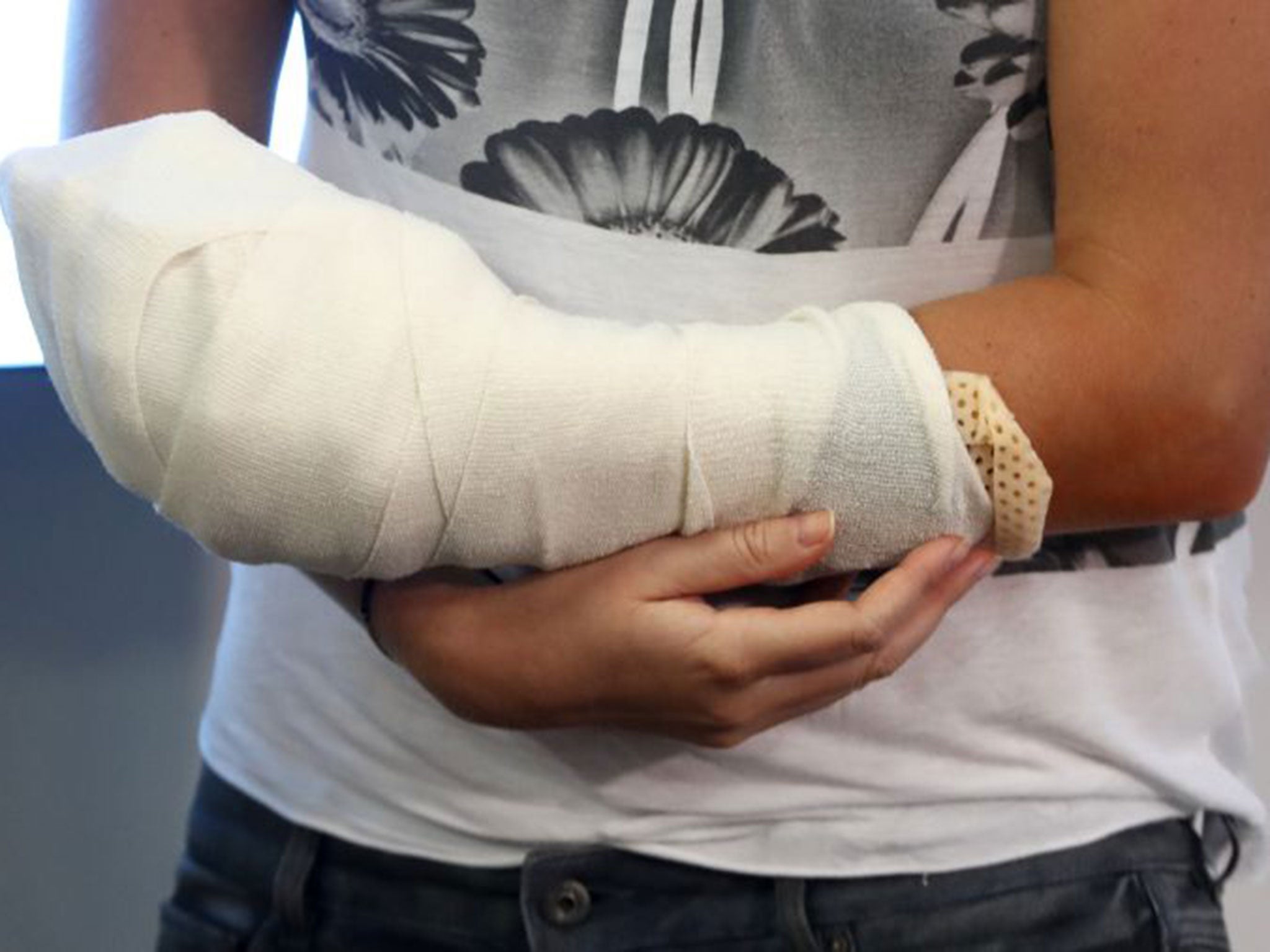 Kvitova's left arm was heavily bandaged after surgery