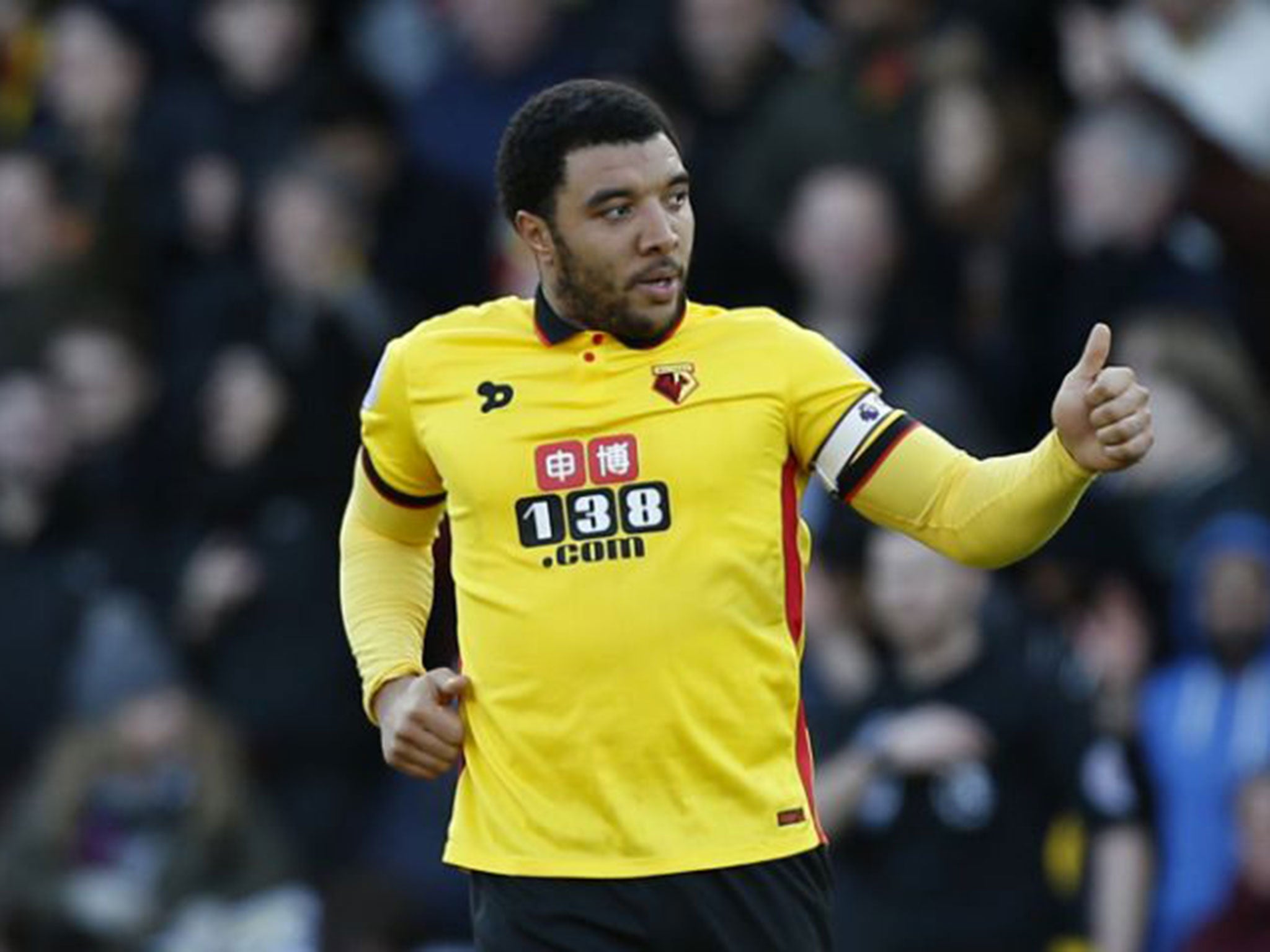 Troy Deeney celebrates scoring his 100th goal for Watford