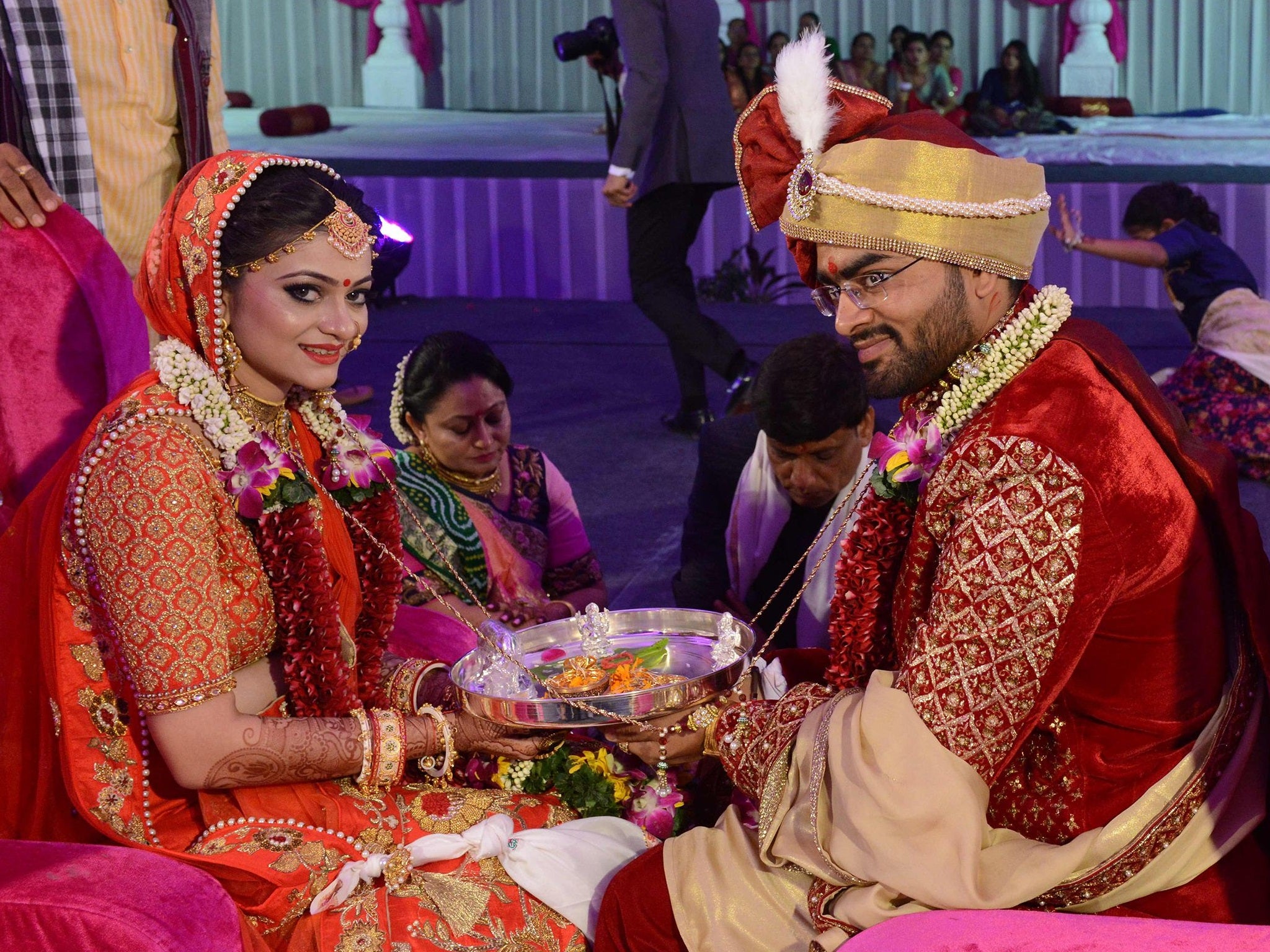 Jay Savani, cousin of Mahesh Savani, weds his bride Divya at a mass wedding of 236 fatherless girls