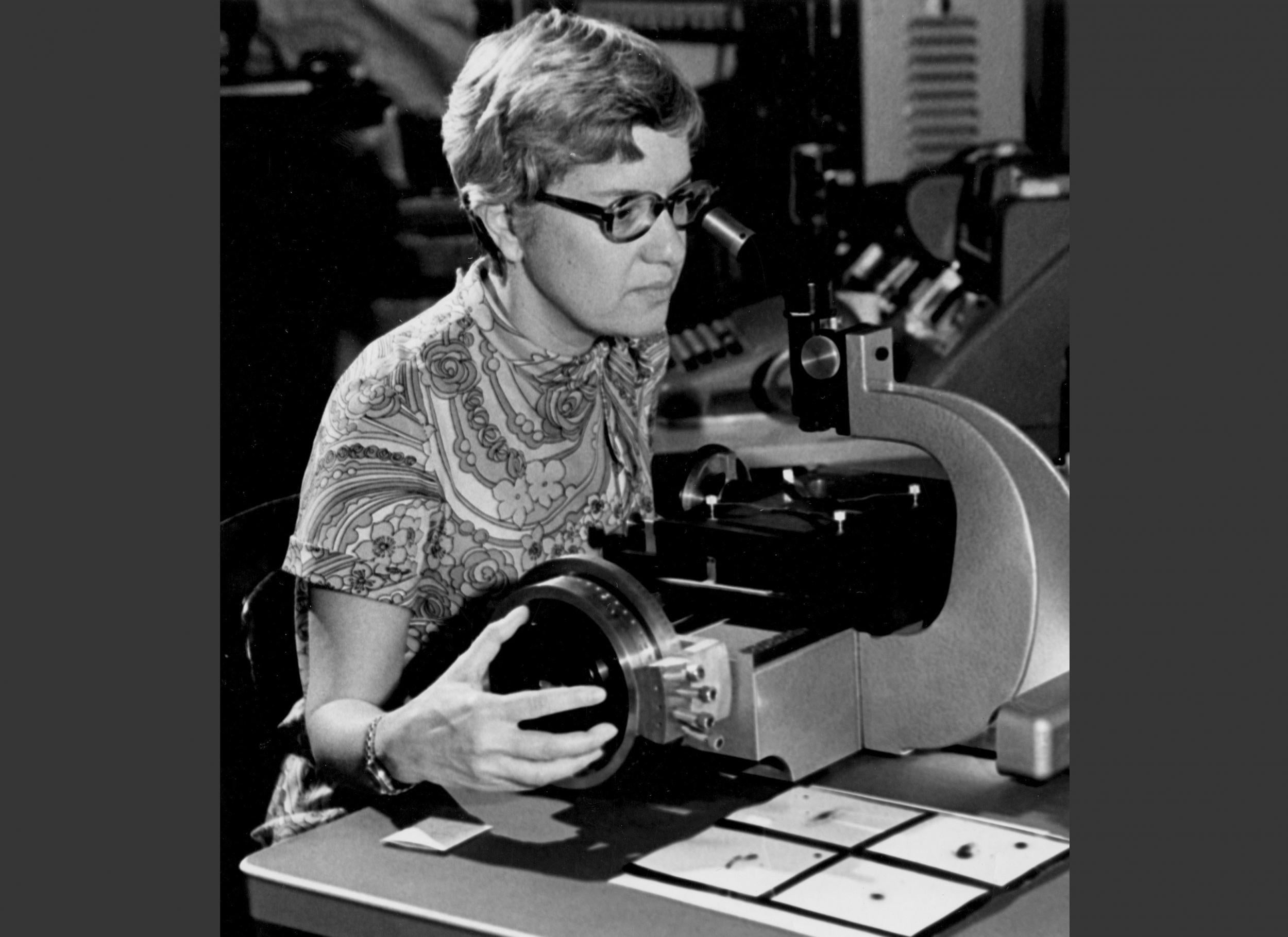 In this image taken in the 1970s and provided by the Carnegie Institution of Washington, Vera Rubin uses a measuring engine