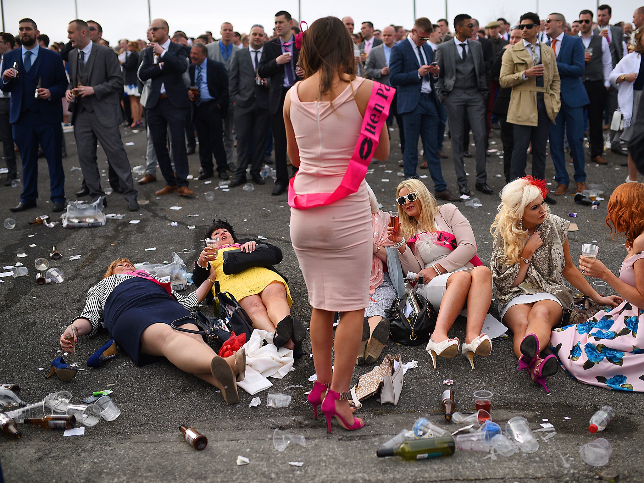 Ladies Day at the Grand National in April this year. Despite images like this frequently adorning front pages, men on average drink far more than women