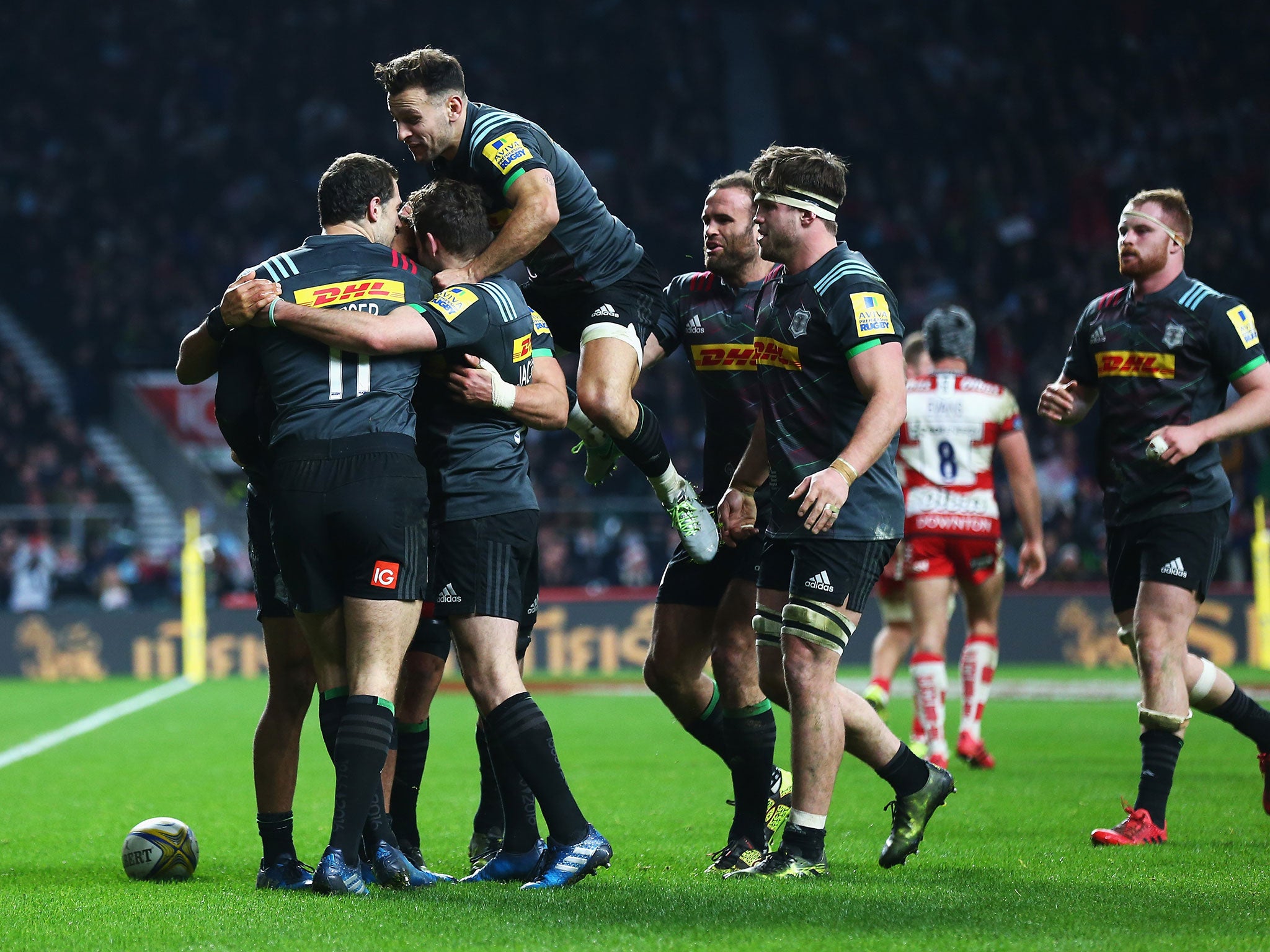 Joe Marchant is congratulated by team mates following his first try