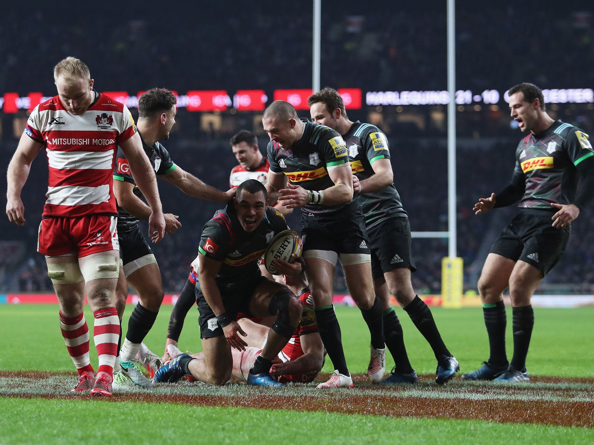 Joe Marchant celebrates scoring his side's third try at Twickenham