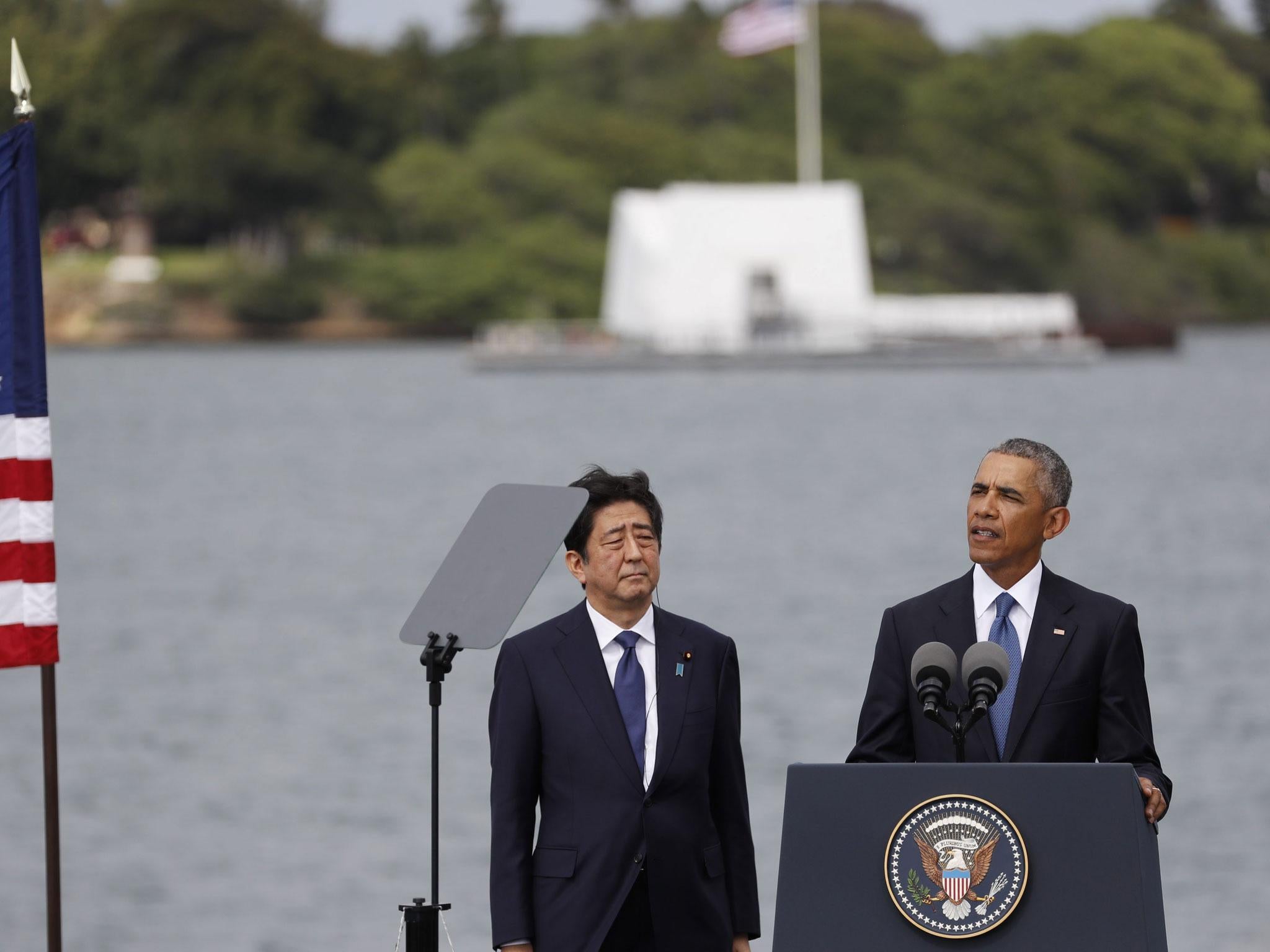 Barack Obama and Shinzo Abe during their joint press conference following their visit to the USS Arizona Memorial