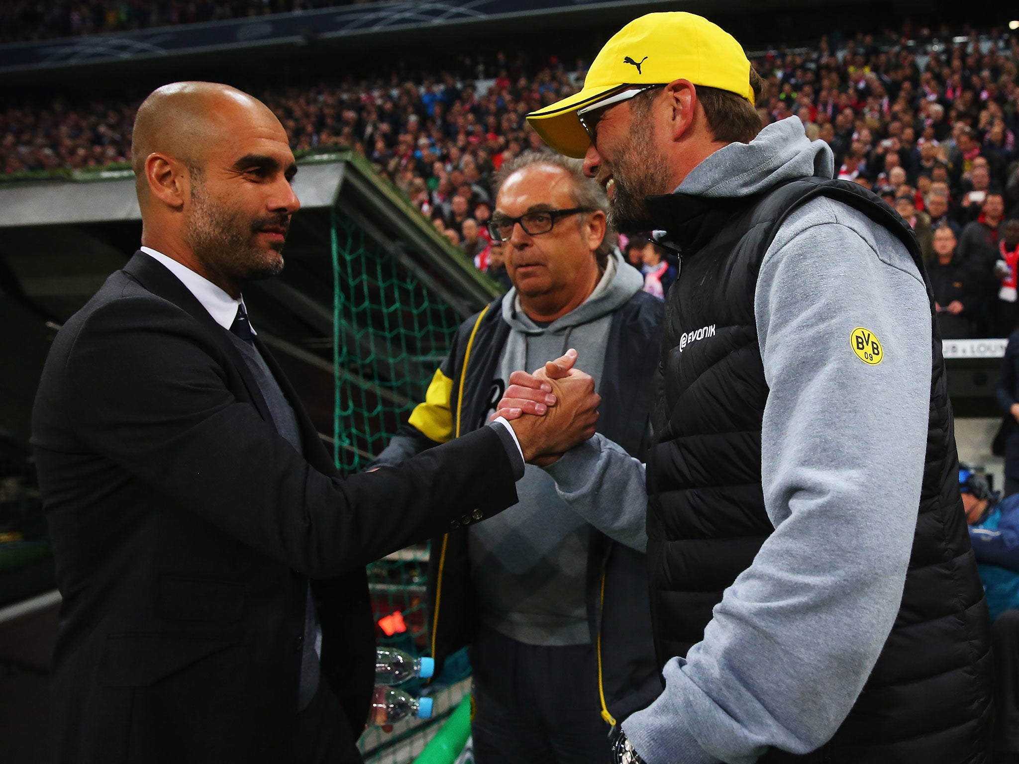 Jurgen Klopp and Pep Guardiola meet at the DFB semi-final match between Borussia Dortmund and Bayern Munich in 2015