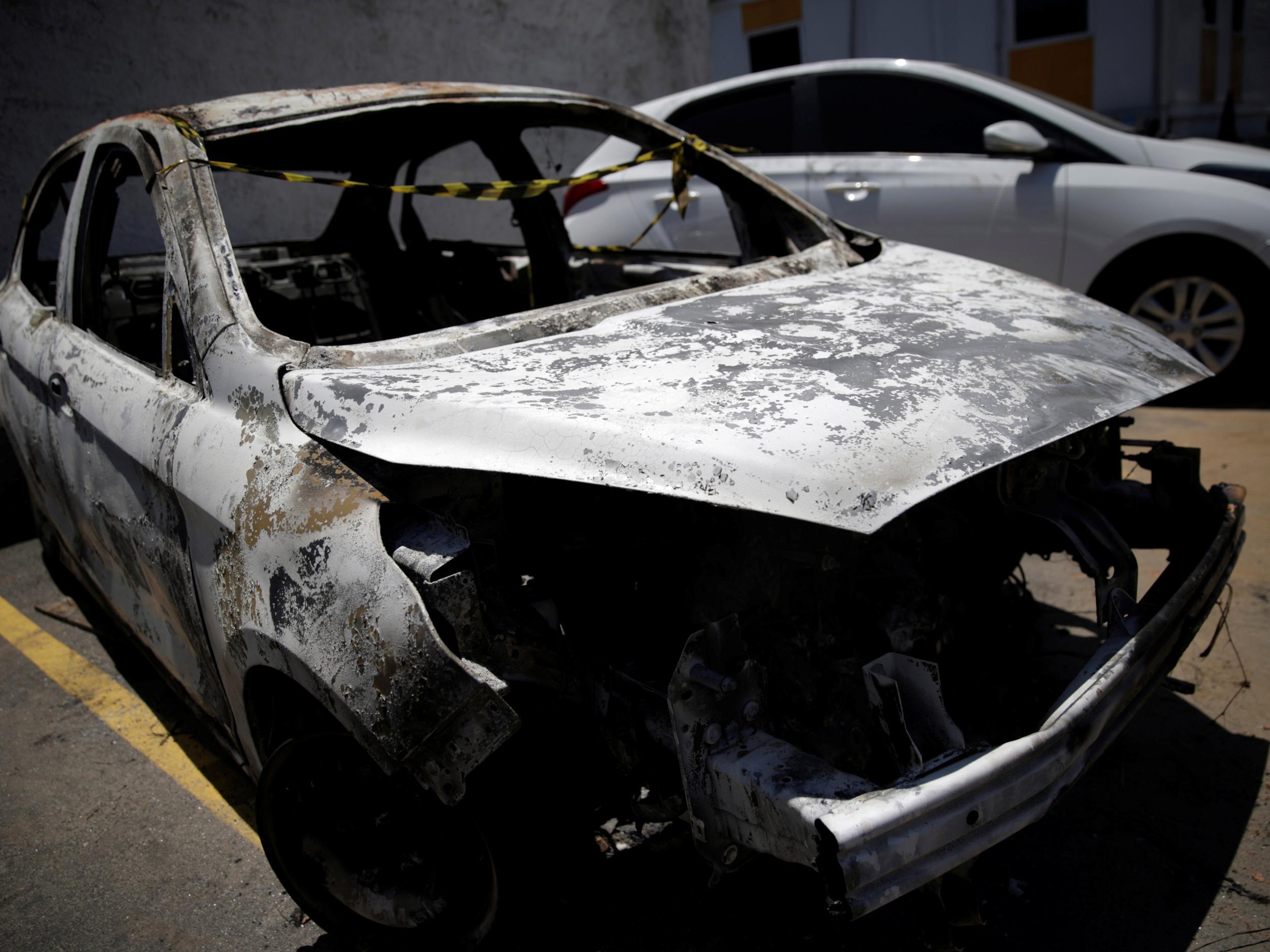 A burned corpse was found inside a car parked under a motorway overpass