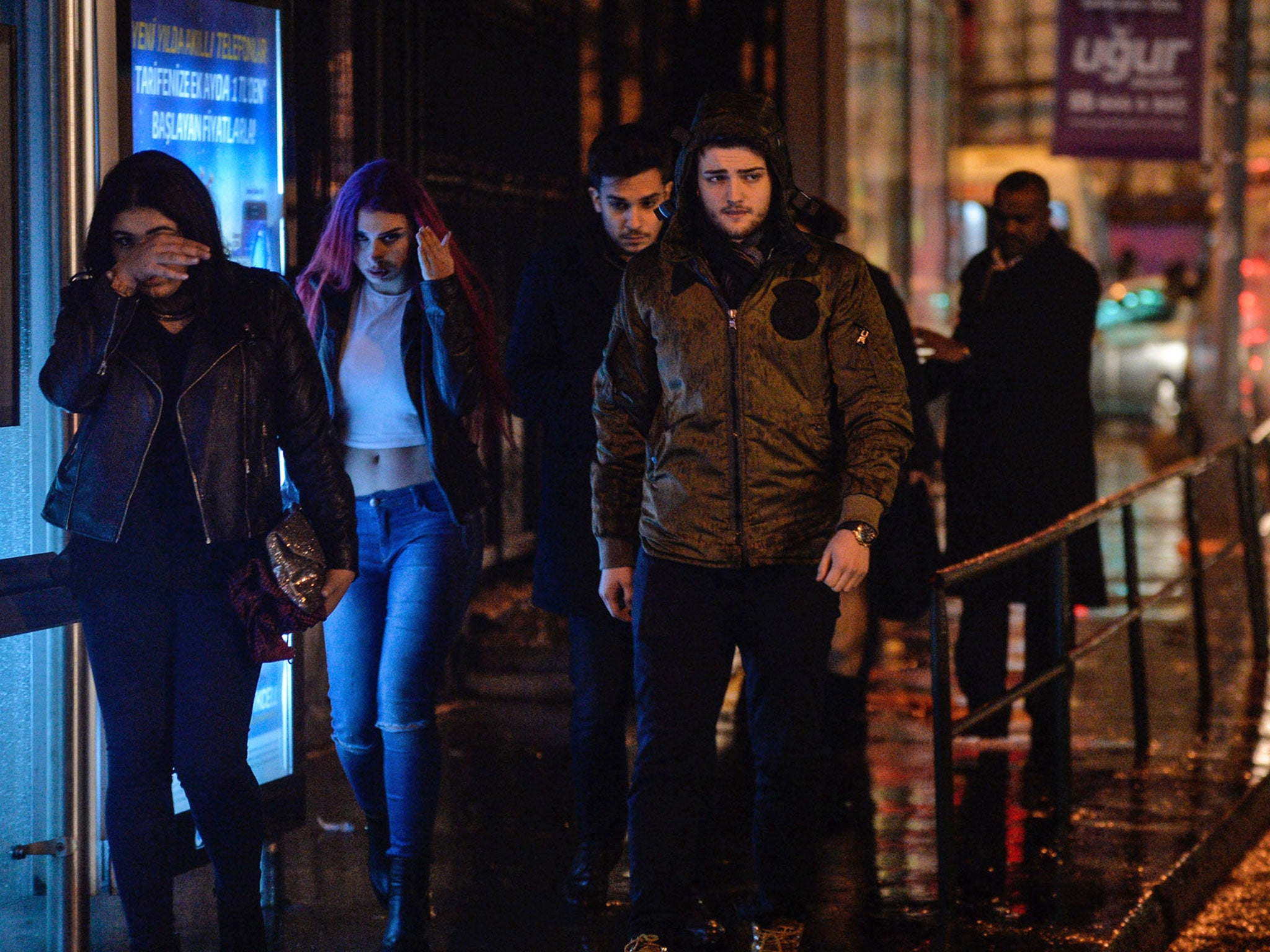People leave a nightclub in Istanbul after it was attacked on 1 January