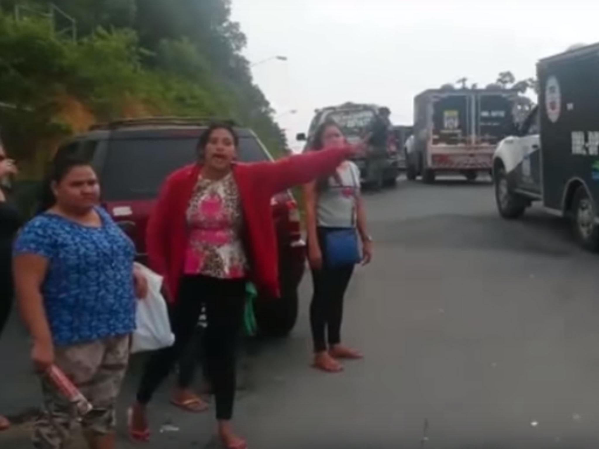 Families of prisoners outside the jail as some of the bodies are removed