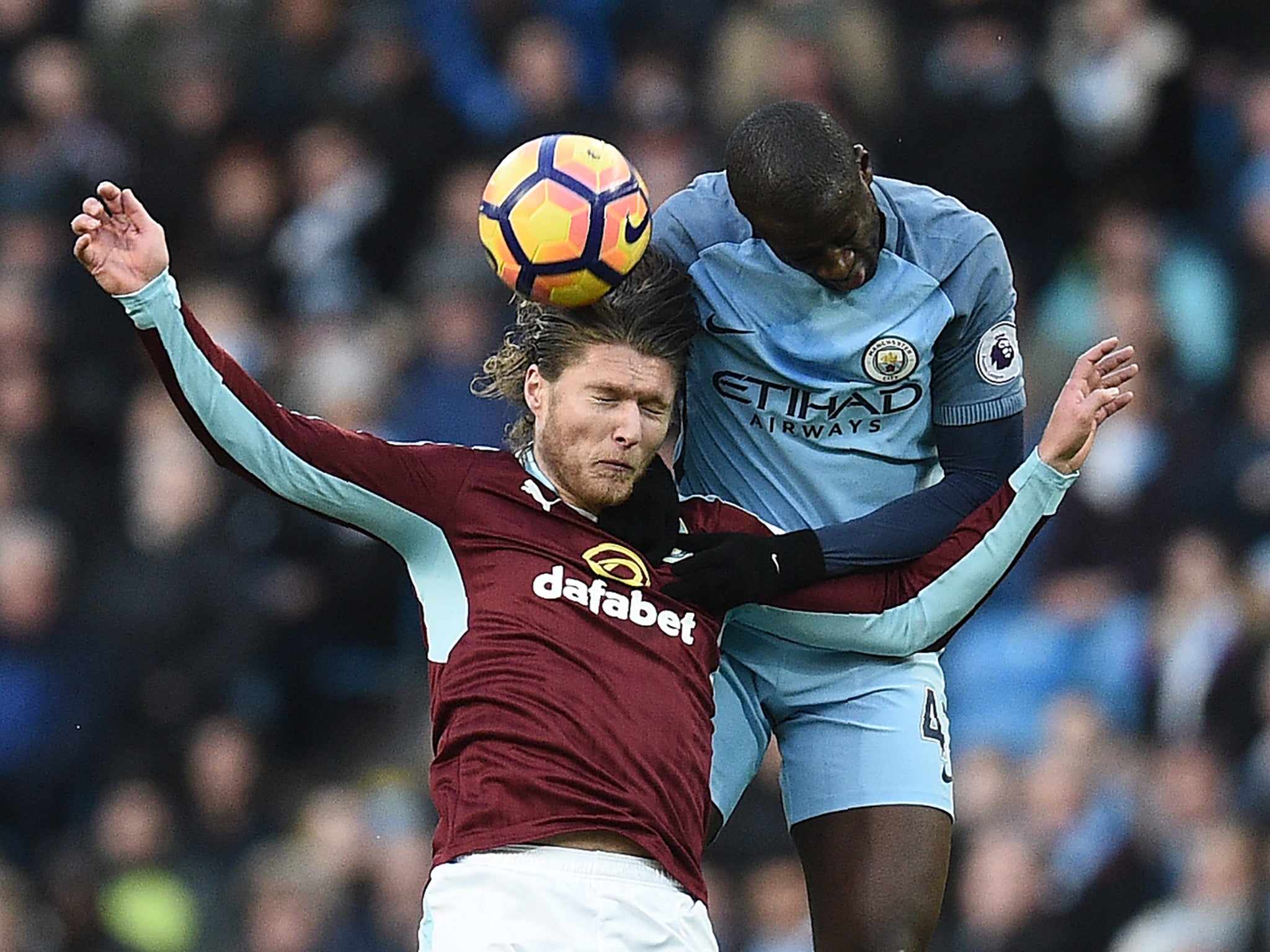 Toure and Hendrick battle for the ball at the Etihad