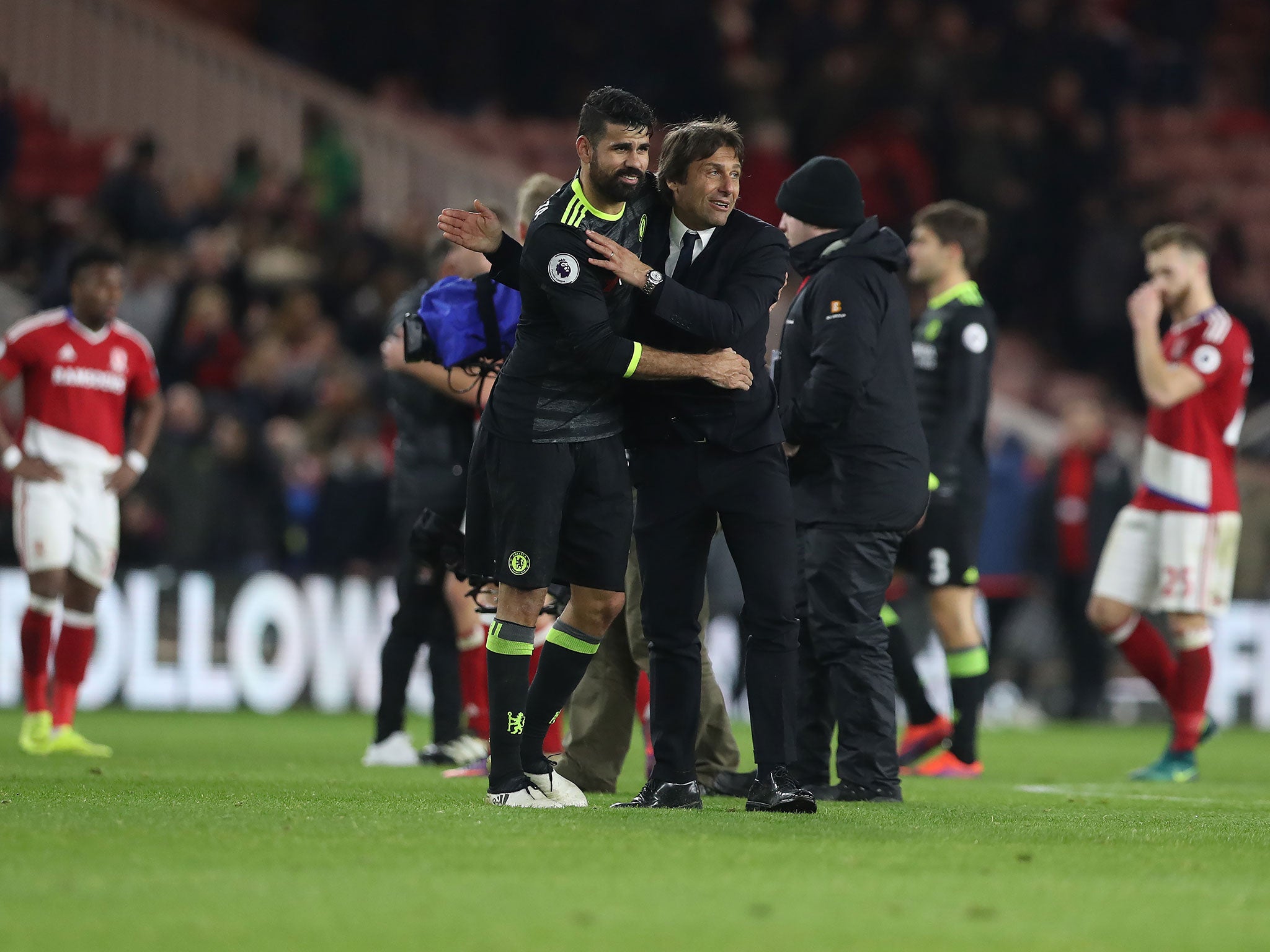 Antonio Conte with Chelsea's leading forward Diego Costa