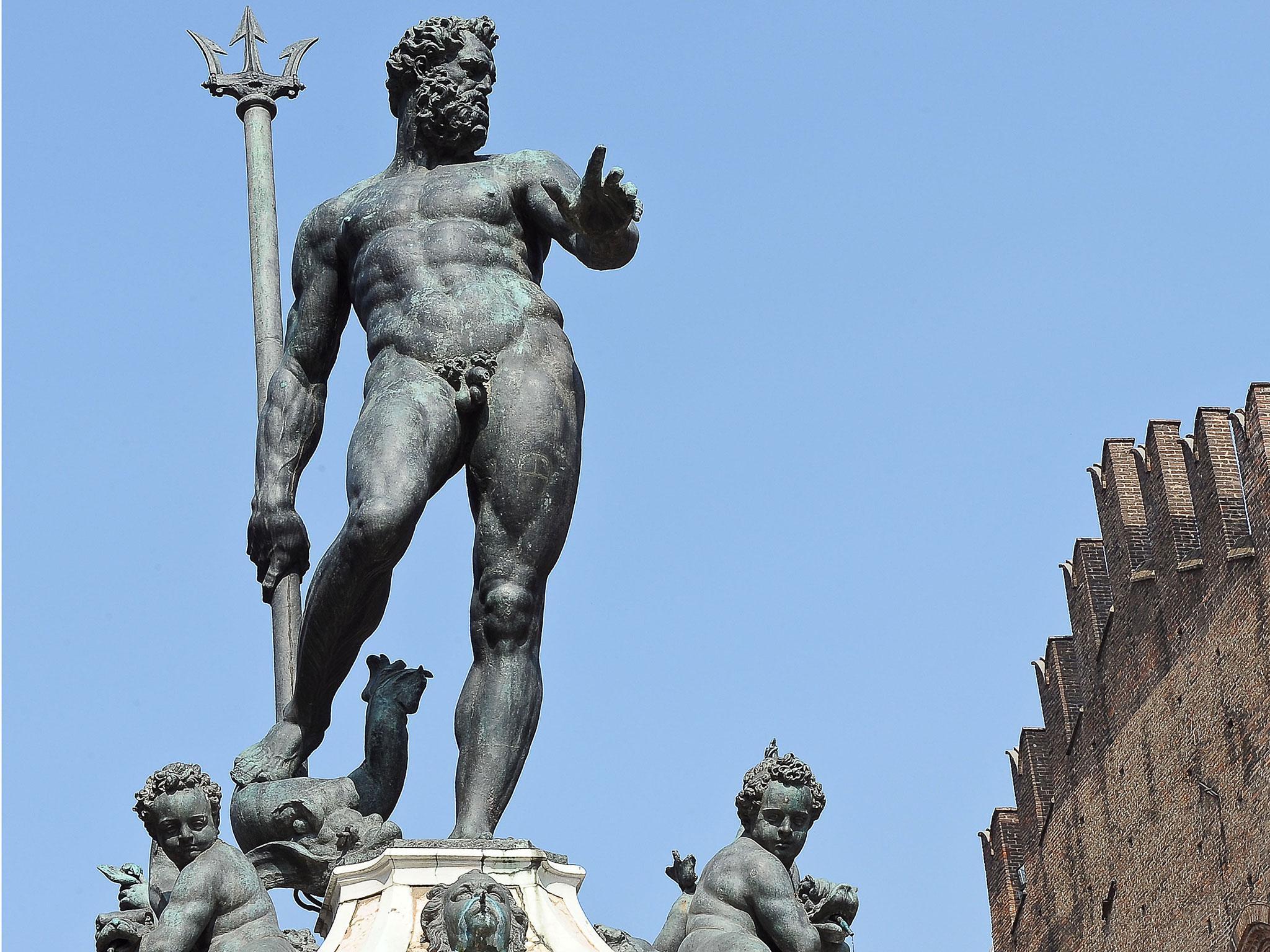 The 3.2 metre high bronze statue stands in the Piazza del Nettuno, in Bologna, Italy