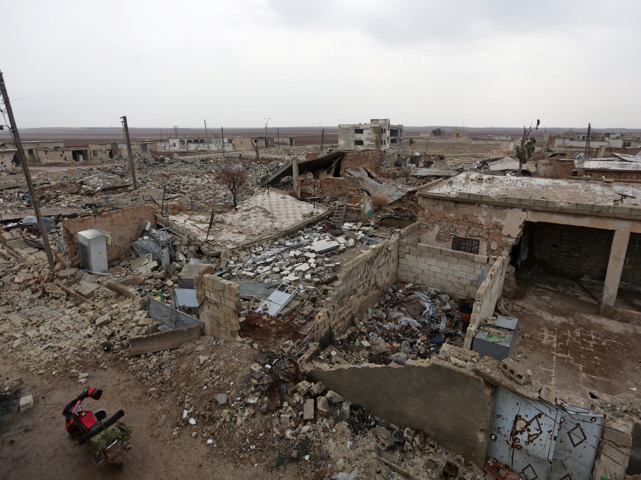 A general view shows the damage in Doudyan village in northern Aleppo Governorate,