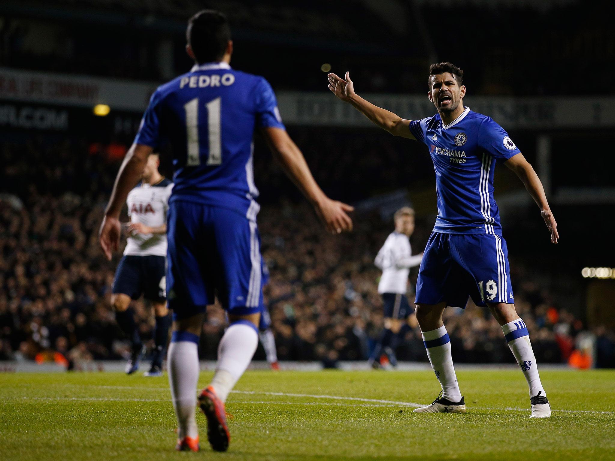 Pedro and Costa engage in a heated argument in the first half (Reuters)