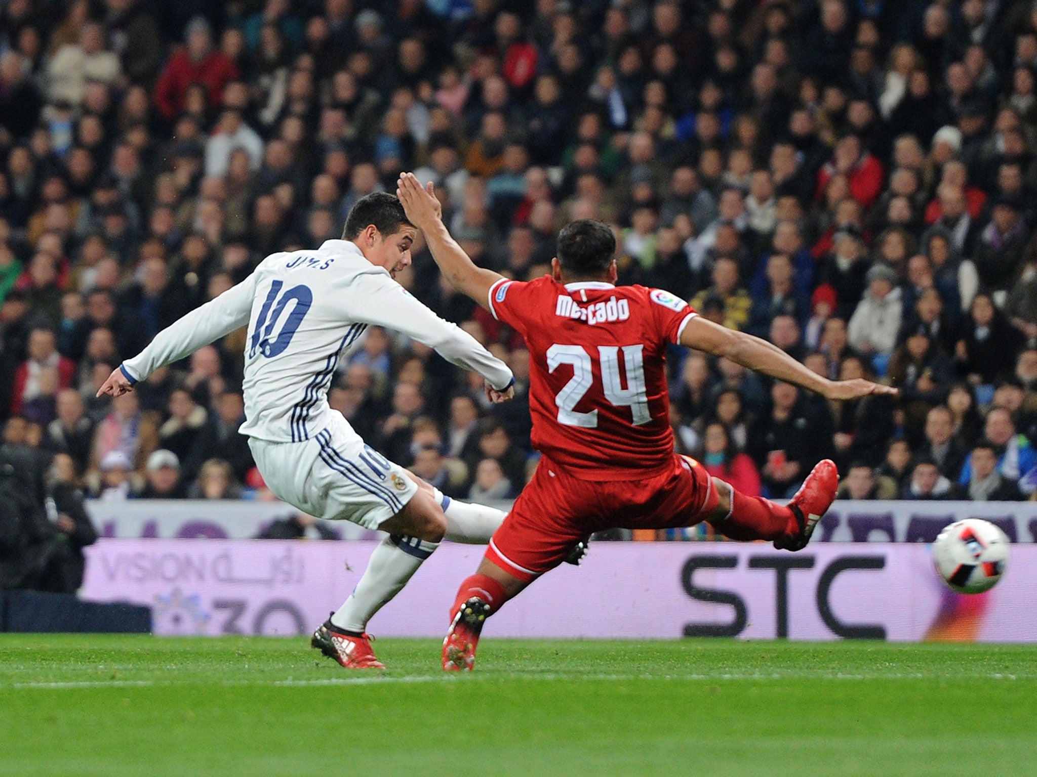 James Rodriguez shoots to open the scoring for Real Madrid