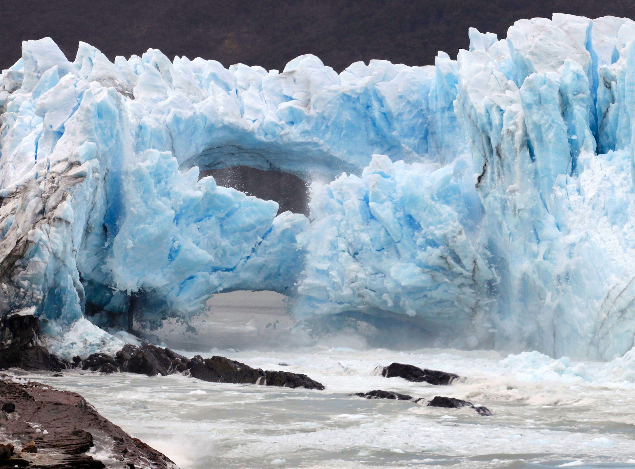 Ice cracks from the wall of the Perito Moreno Glacier located at Los Glaciares National Park