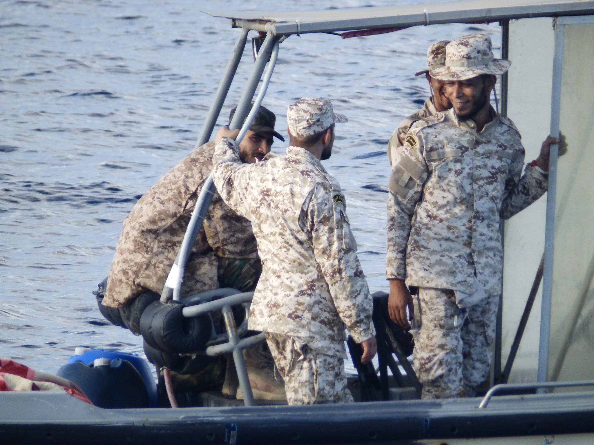 A Libyan coastguard boat observing a rescue by MSF’s Bourbon Argos ship on 4 November 2016