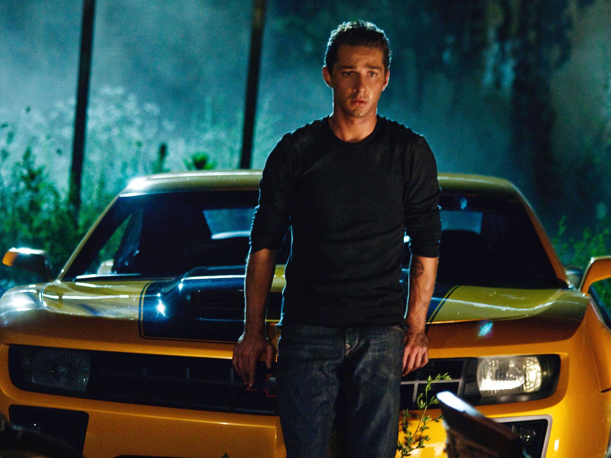 Shia LaBeouf with a vintage yellow Camaro in ‘Transformers’