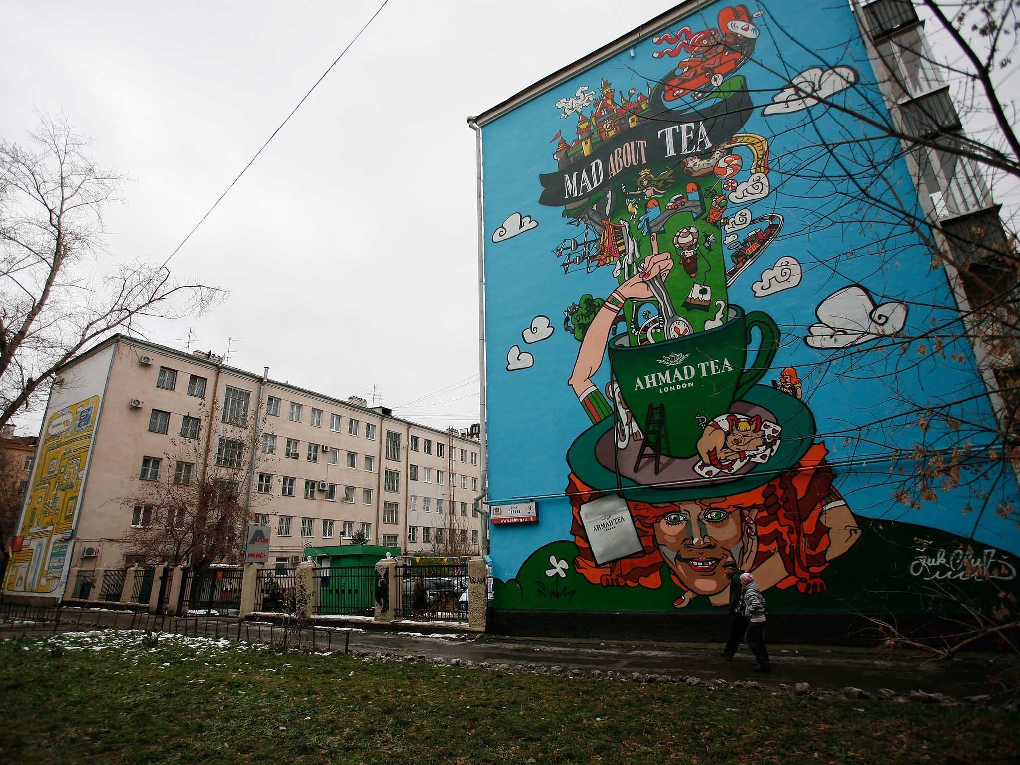 An advertisement for Ahmad Tea painted on the side of an apartment block, in Yekaterinburg, Russia