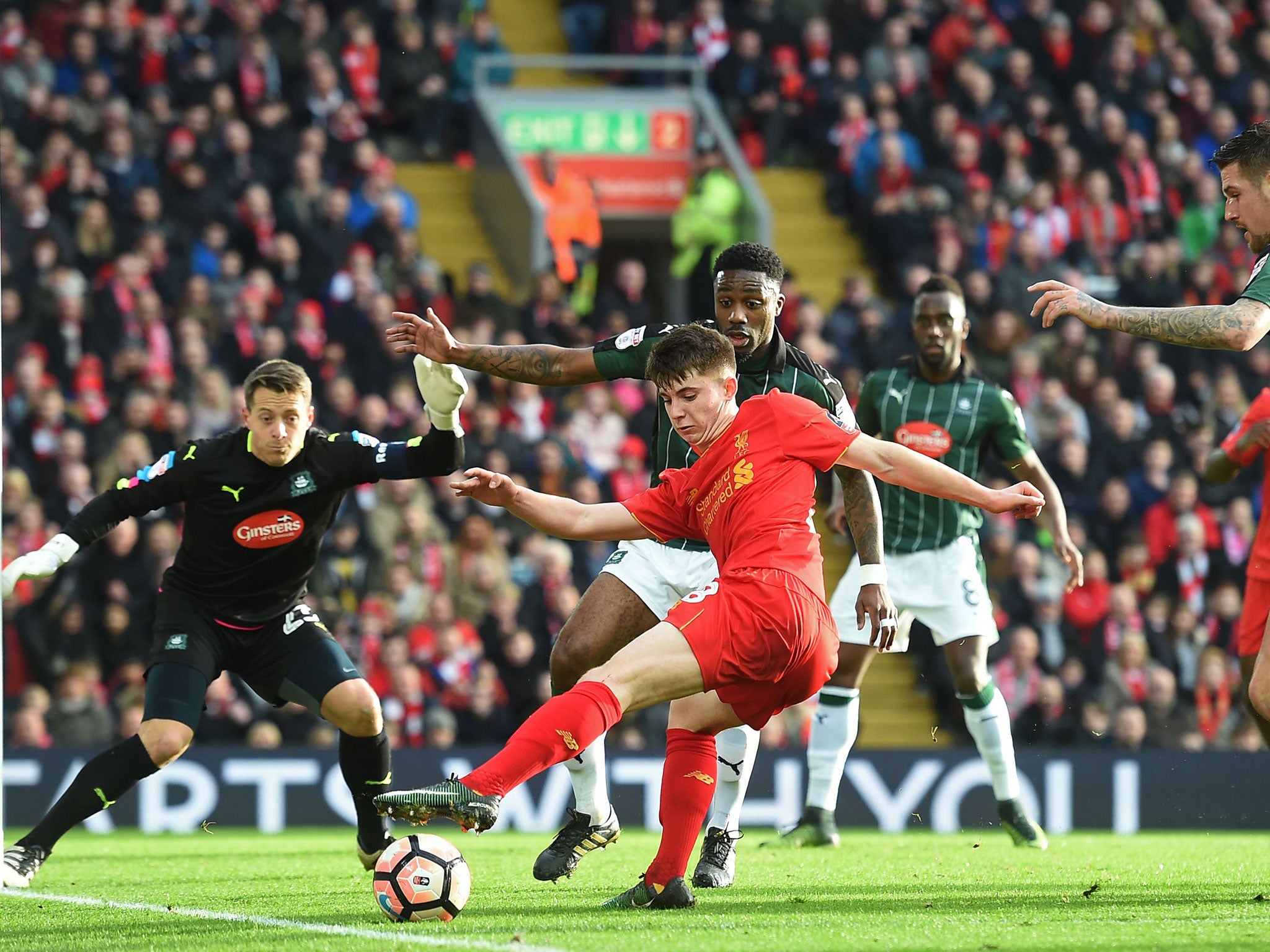 Ben Woodburn attempts to get a shot off on goal from a tight angle