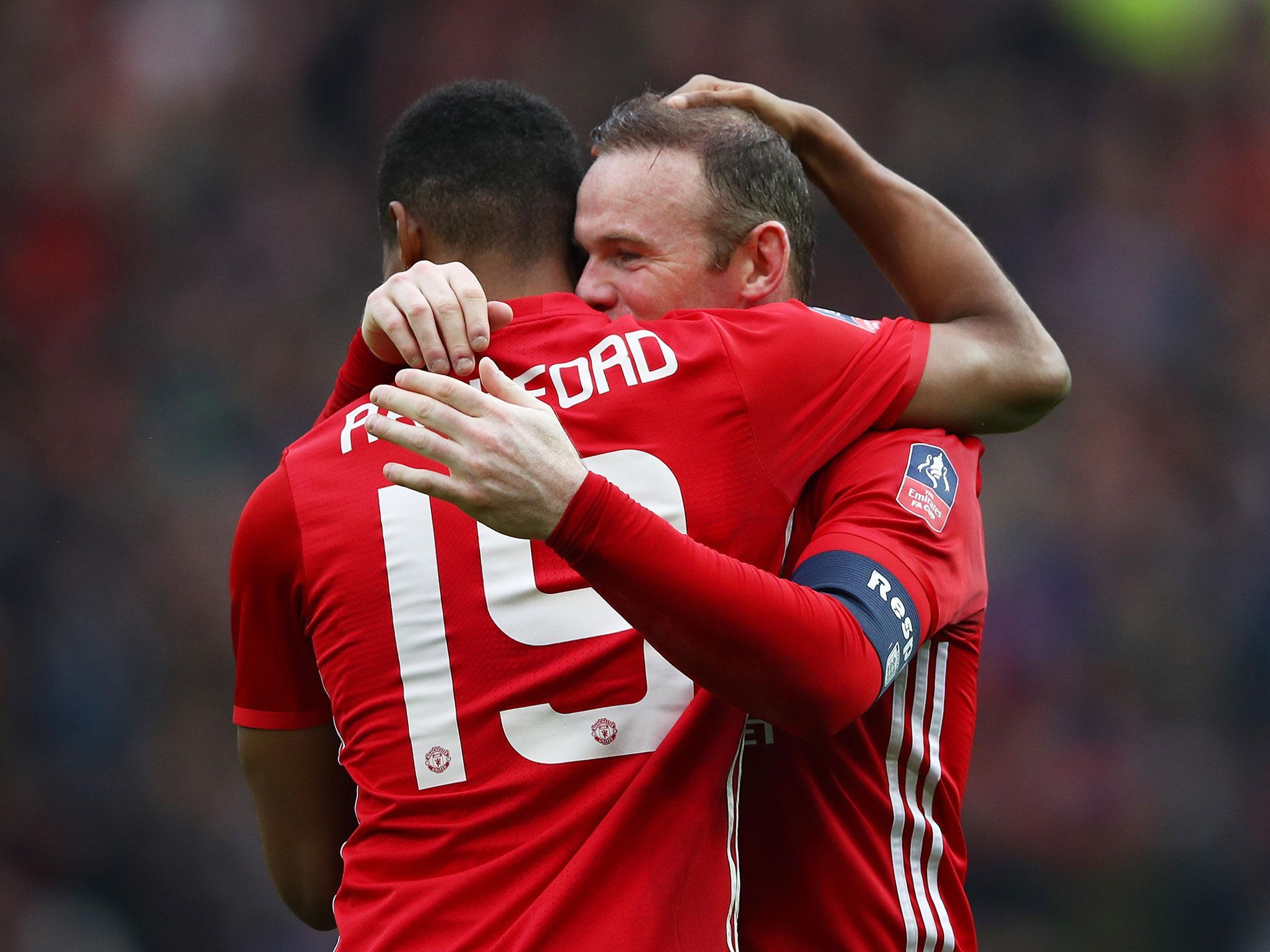 Rashford scored twice in the game that saw Rooney match Sir Bobby Charlton's record