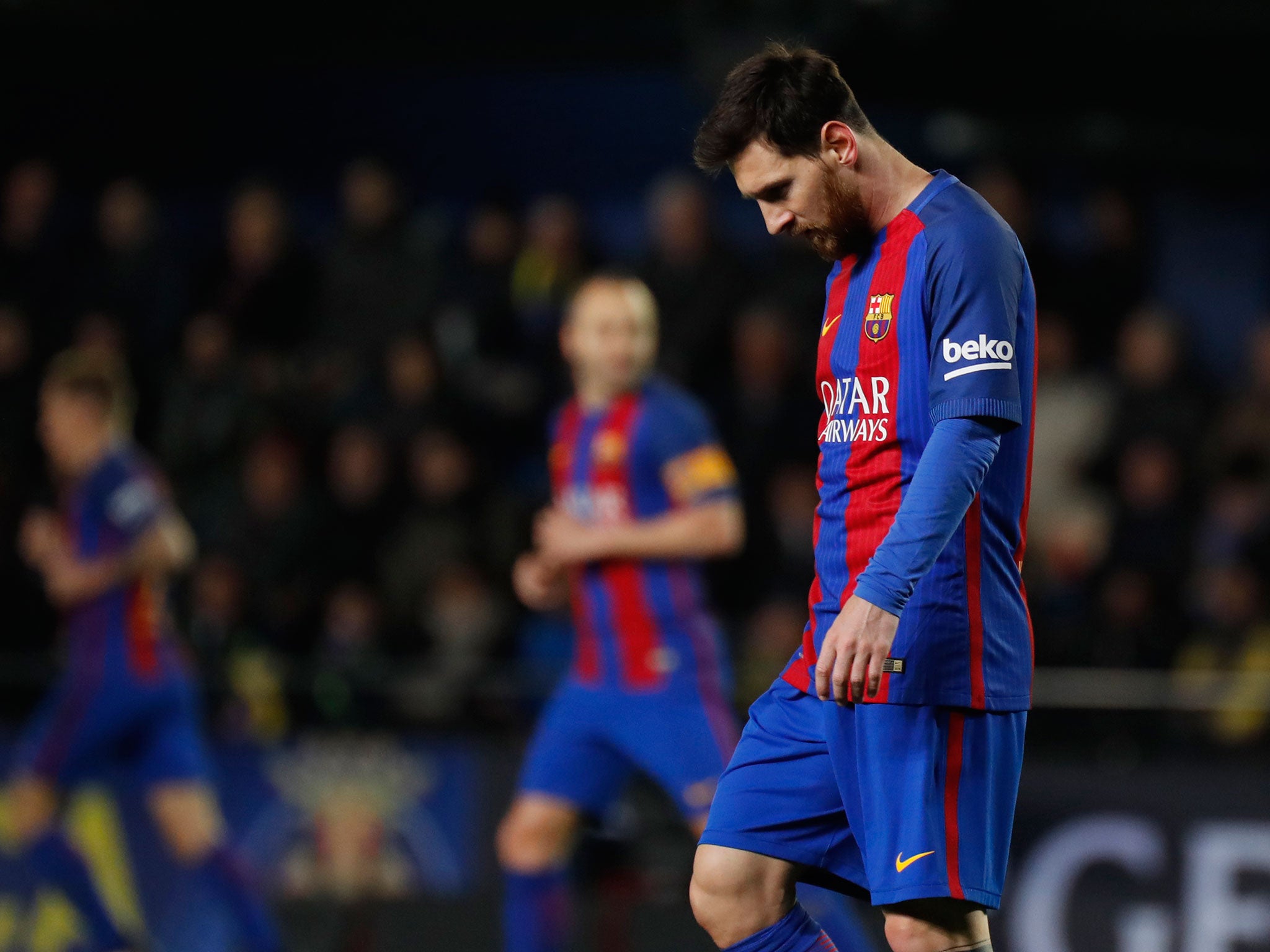 Lionel Messi's late free-kick salvaged Barcelona a point from their La Liga clash with Villarreal
