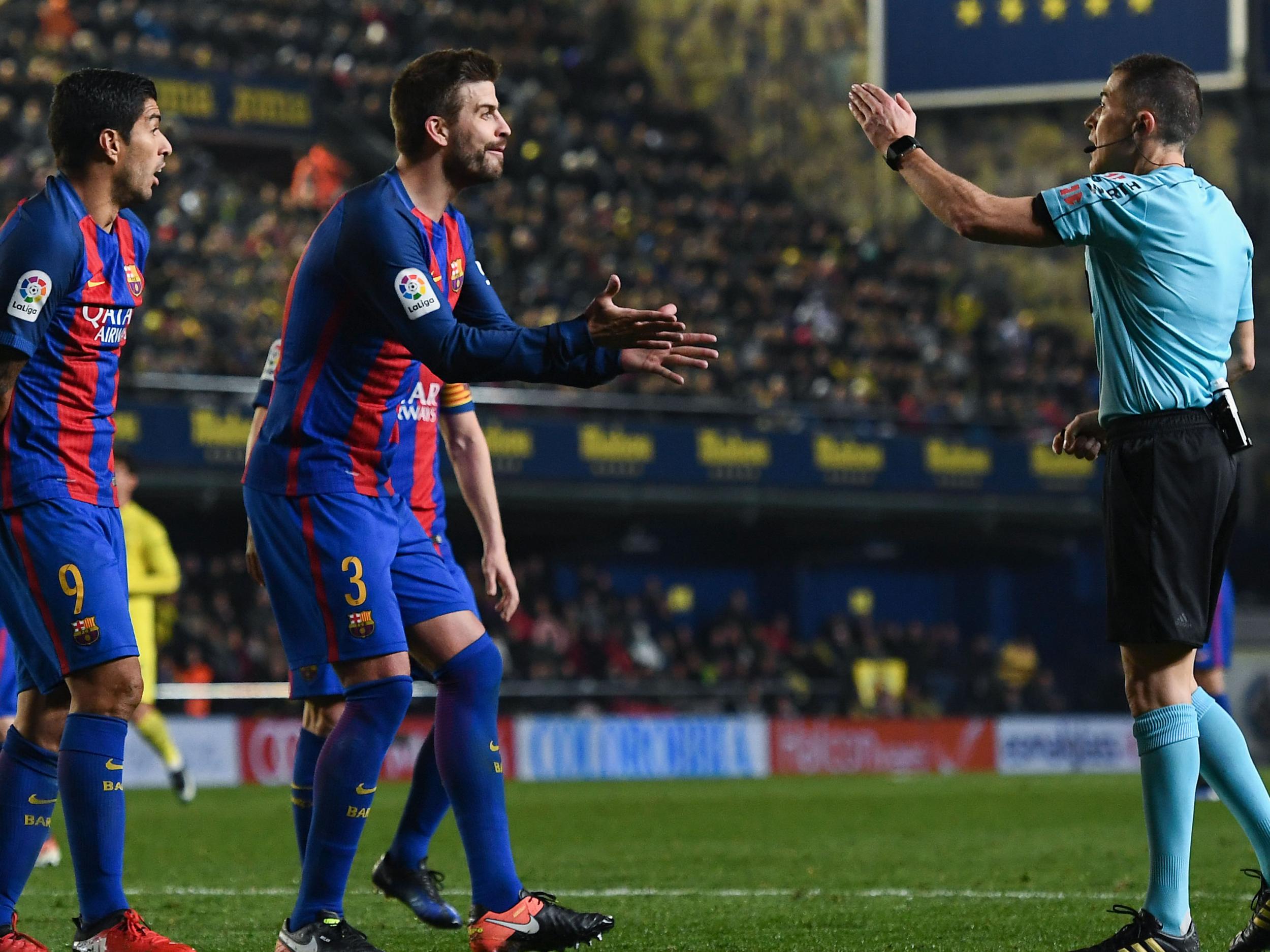 Pique remonstrated with the officials after the penalty claim was turned down