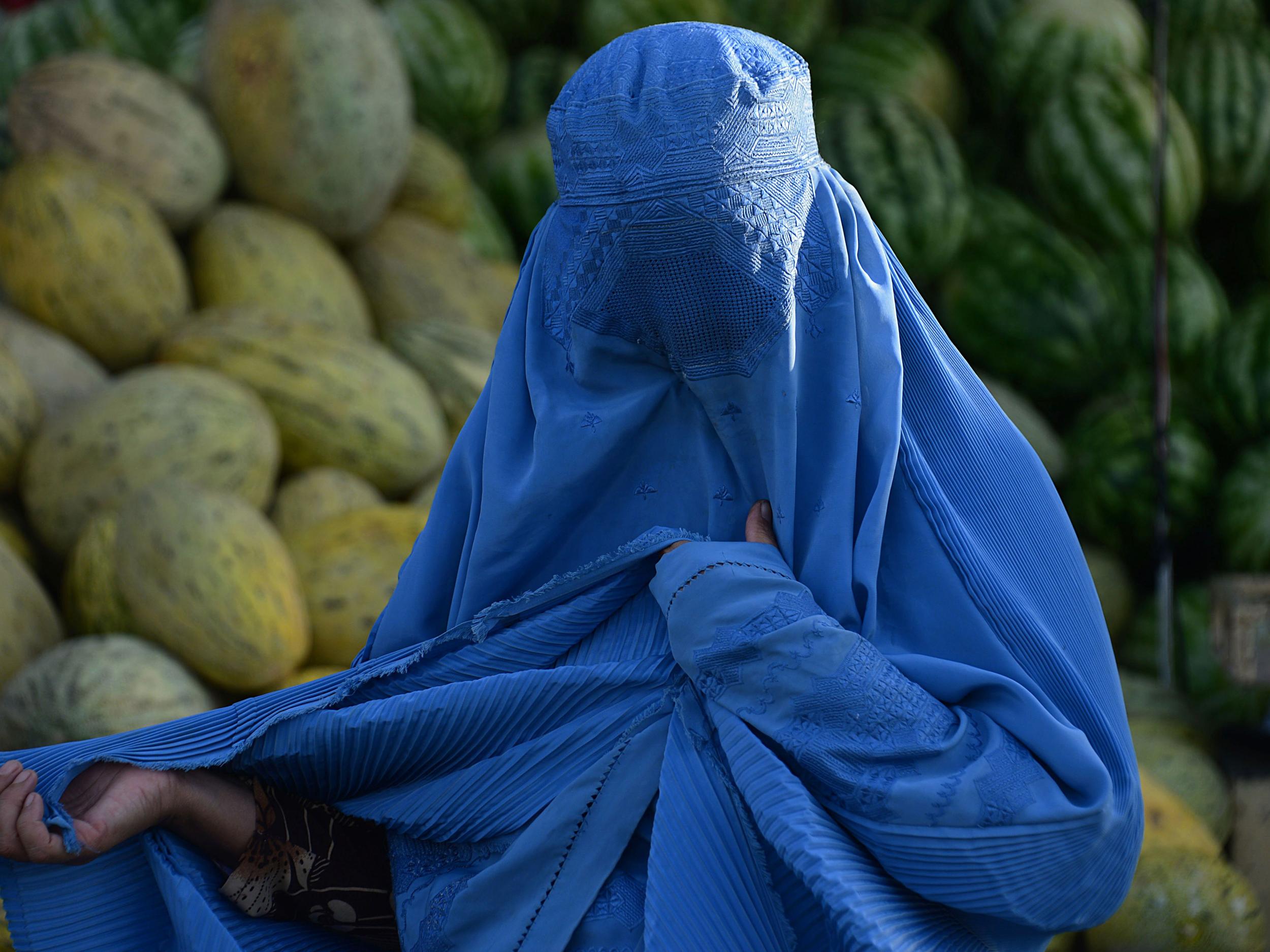 &#13;
Critics have pointed out that burqas, which cover the entire face, are very rarely worn in Germany &#13;