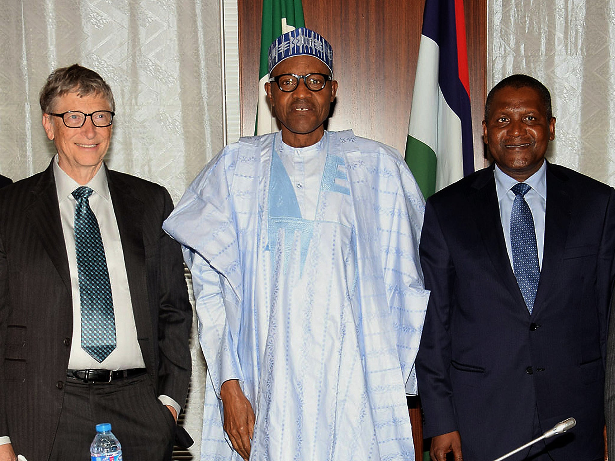 Nigerian President Mohammadu Buhari with Bill Gates and Africa's richest man Aliko Dangote, at the signing of the Abuja Agreement on Polio Eradication