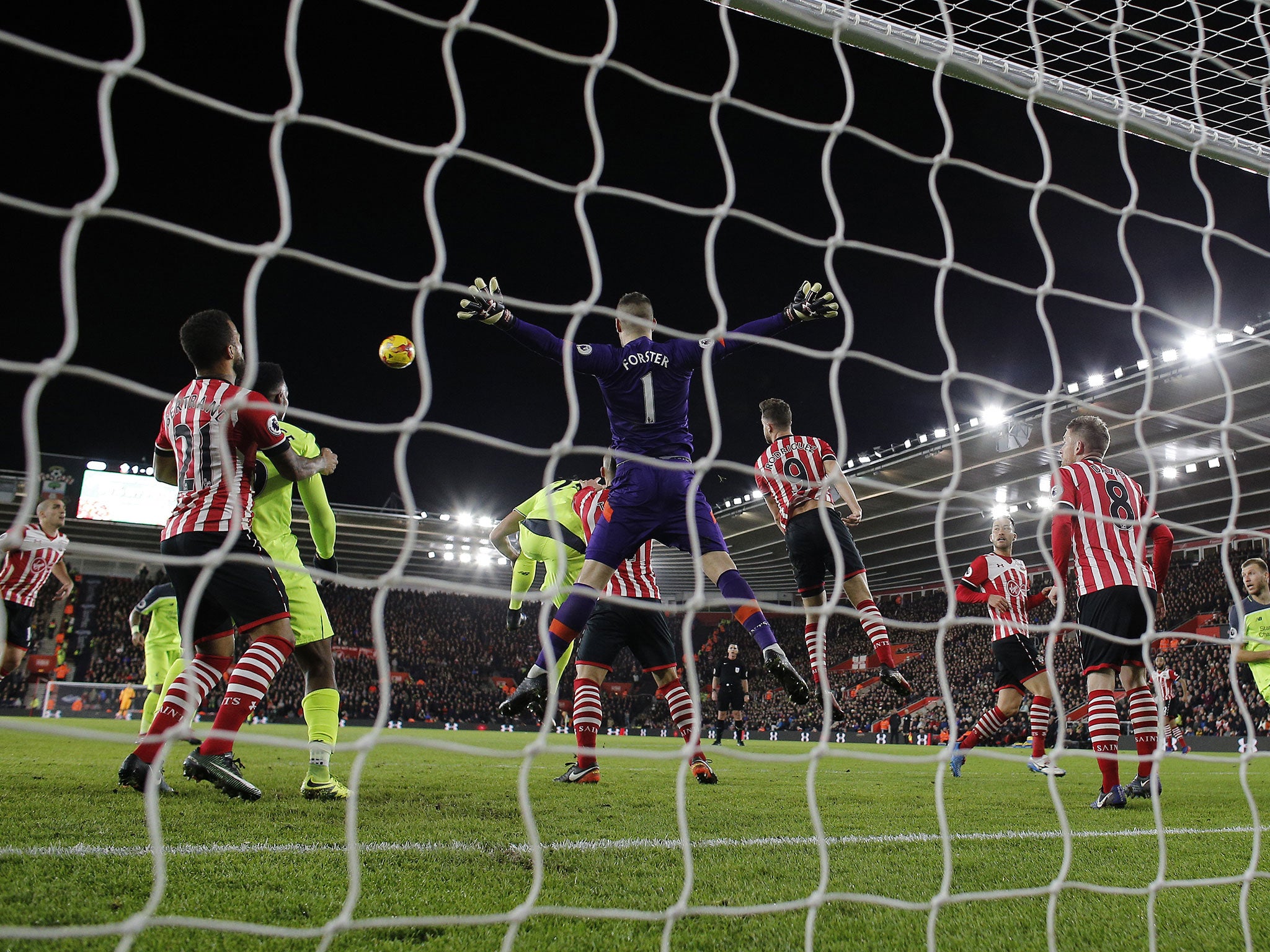 Forster and his team defend a Liverpool corner