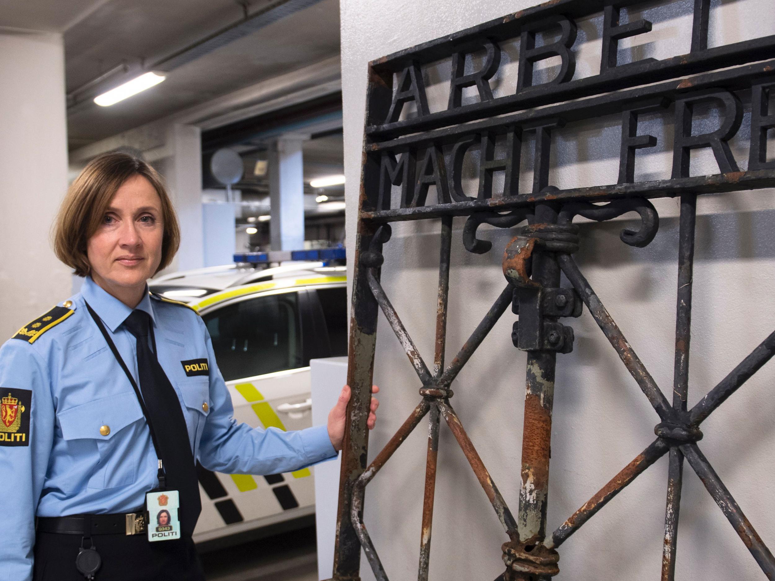 Police Attorney Kari Bjoerkhaug Trones pictured beside the iron gate after it was found on 3 December last year in Bergen