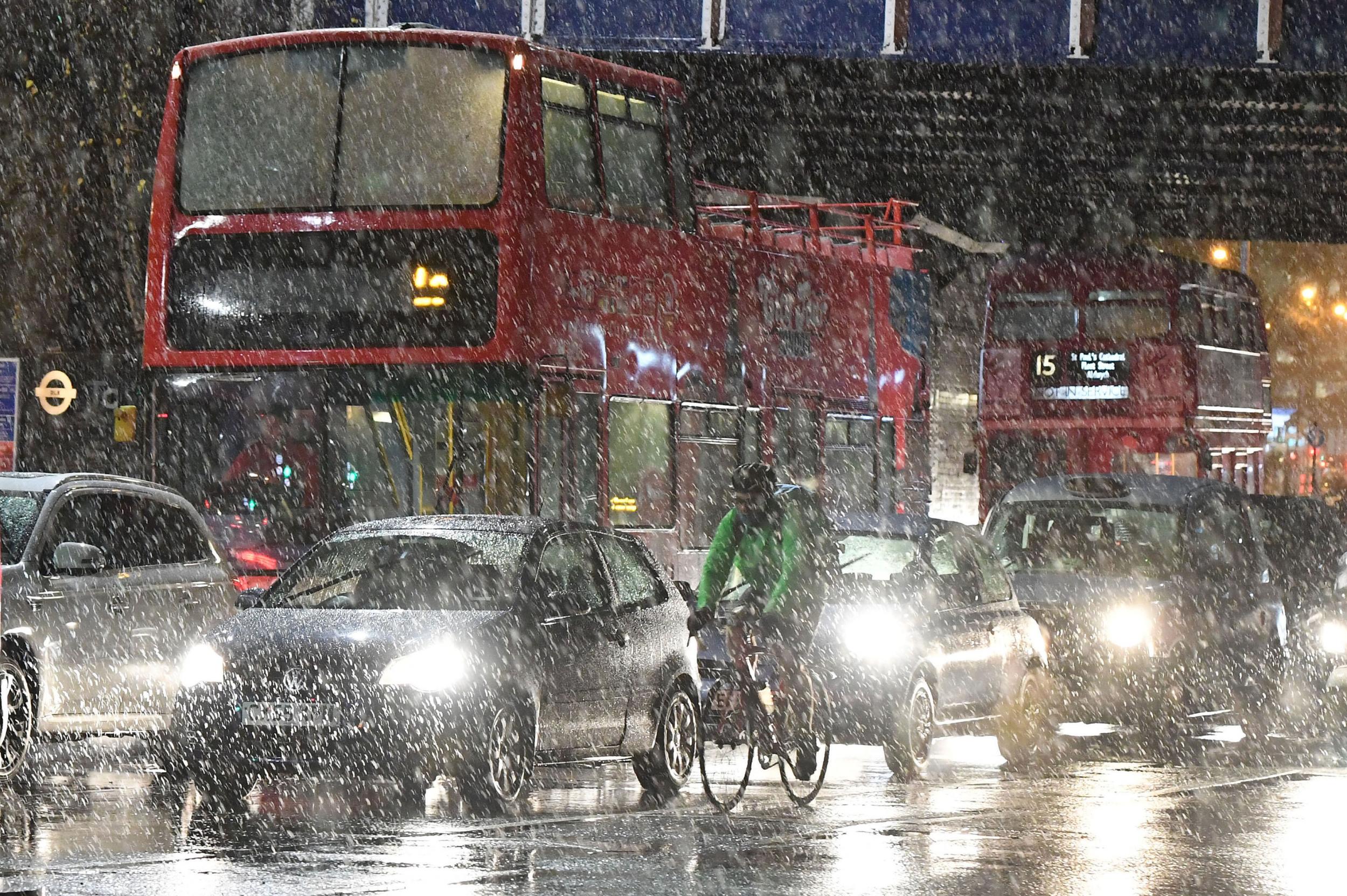 Snow began to fall in London shortly before rush hour