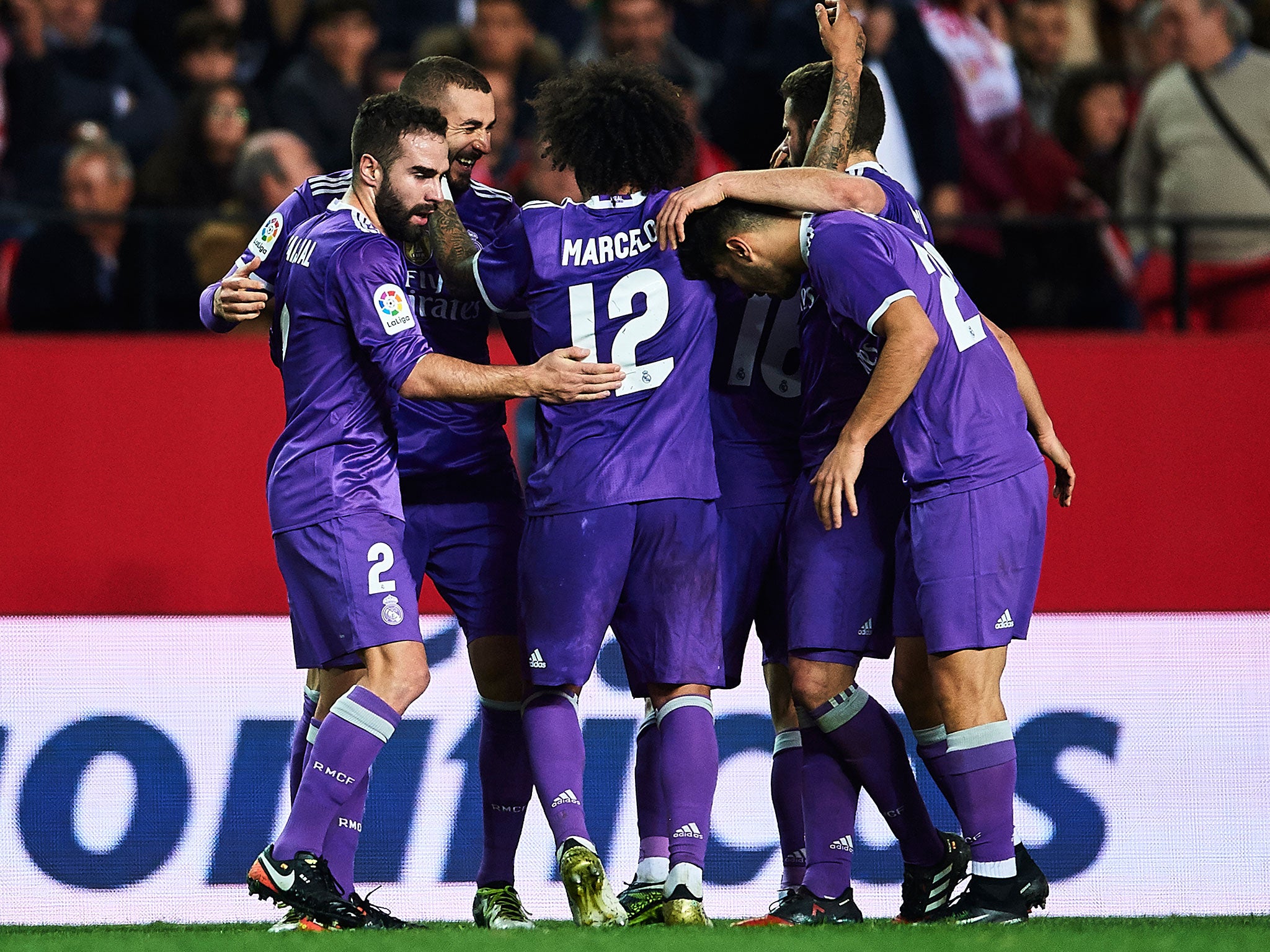 Real Madrid celebrate after Karim Benzema's late equaliser breaks the Spanish unbeaten record