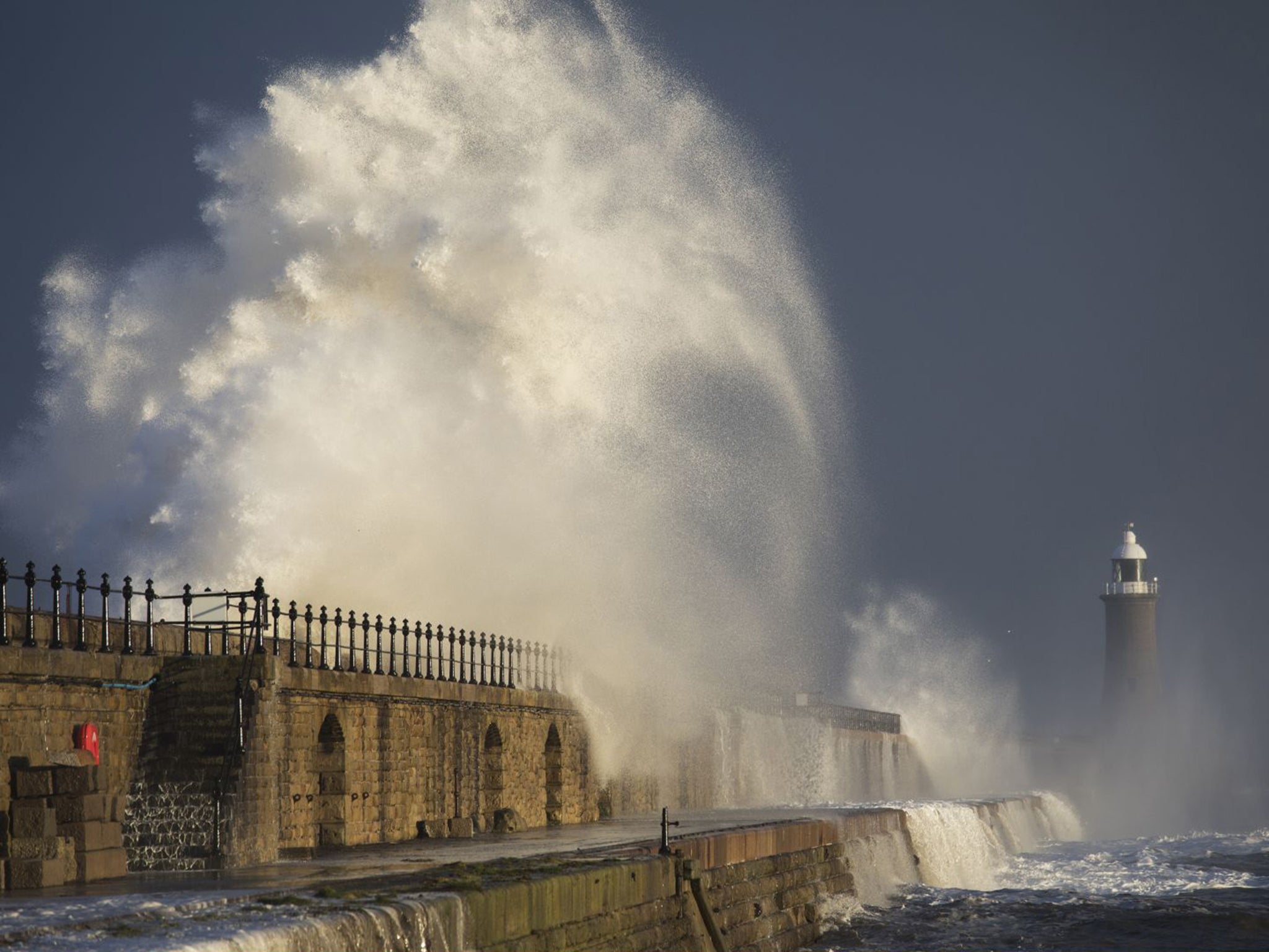 Strong winds sent high waves crashing over Tynemouth Pier in Tyneside yesterday