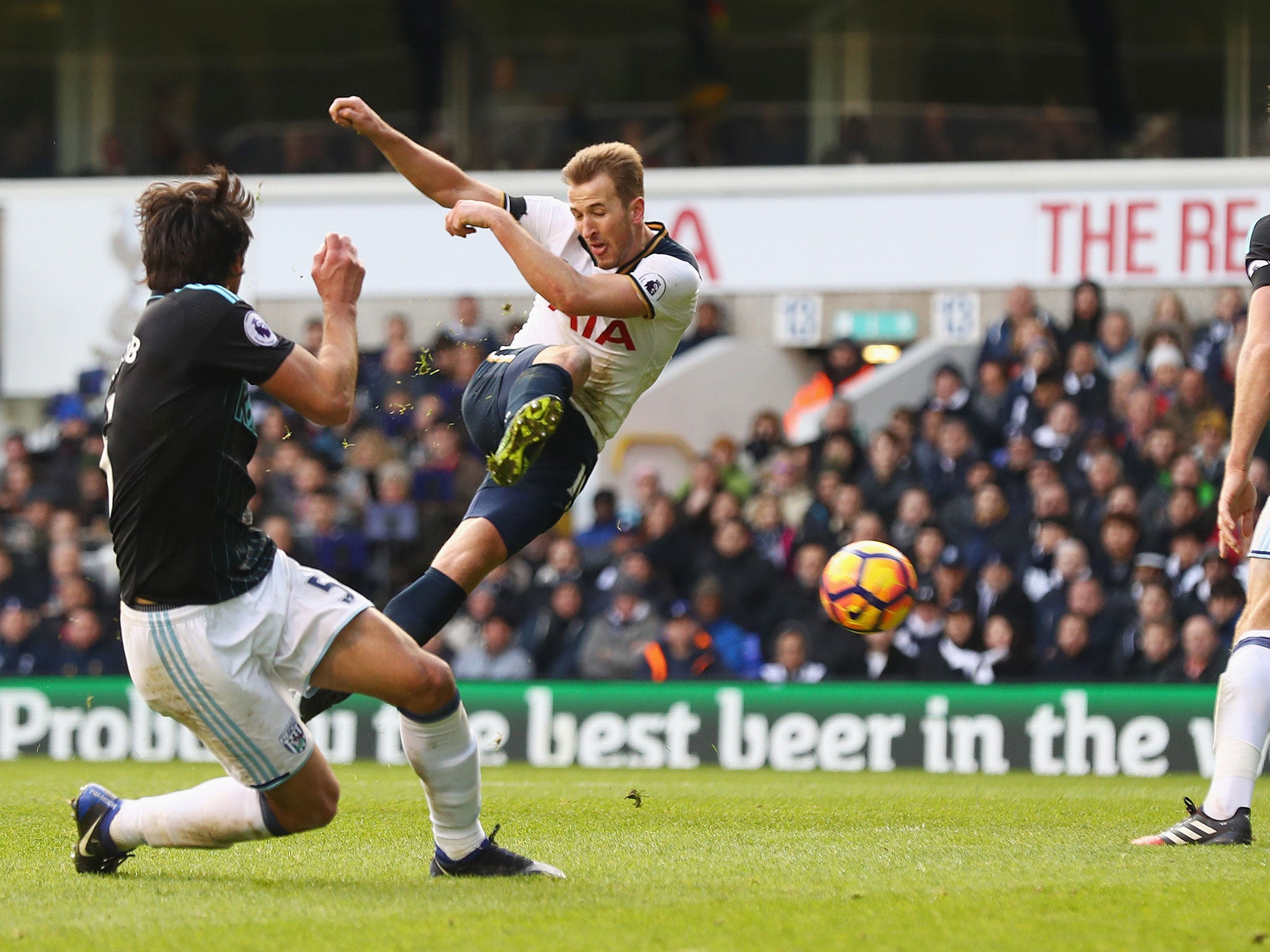 Kane scores his second and Spurs's third with a well-struck effort on the turn