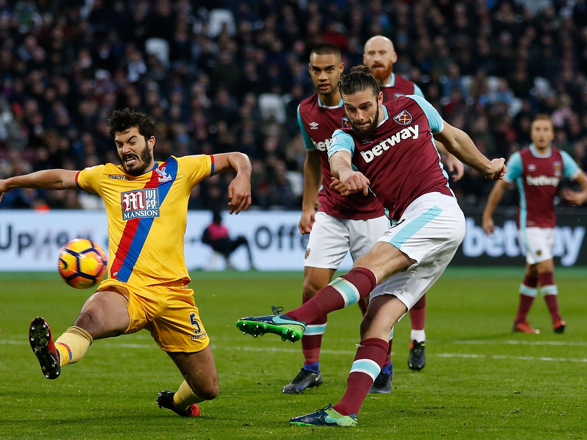 Andy Carroll takes a shot on goal