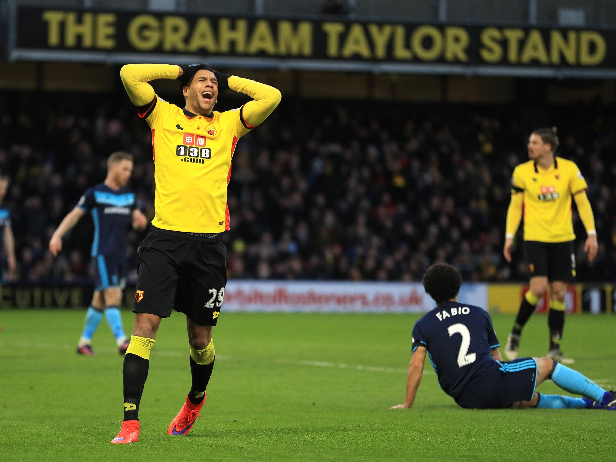 Etienne Capoue reacts to a missed chance with the Graham Taylor stand visible in the background