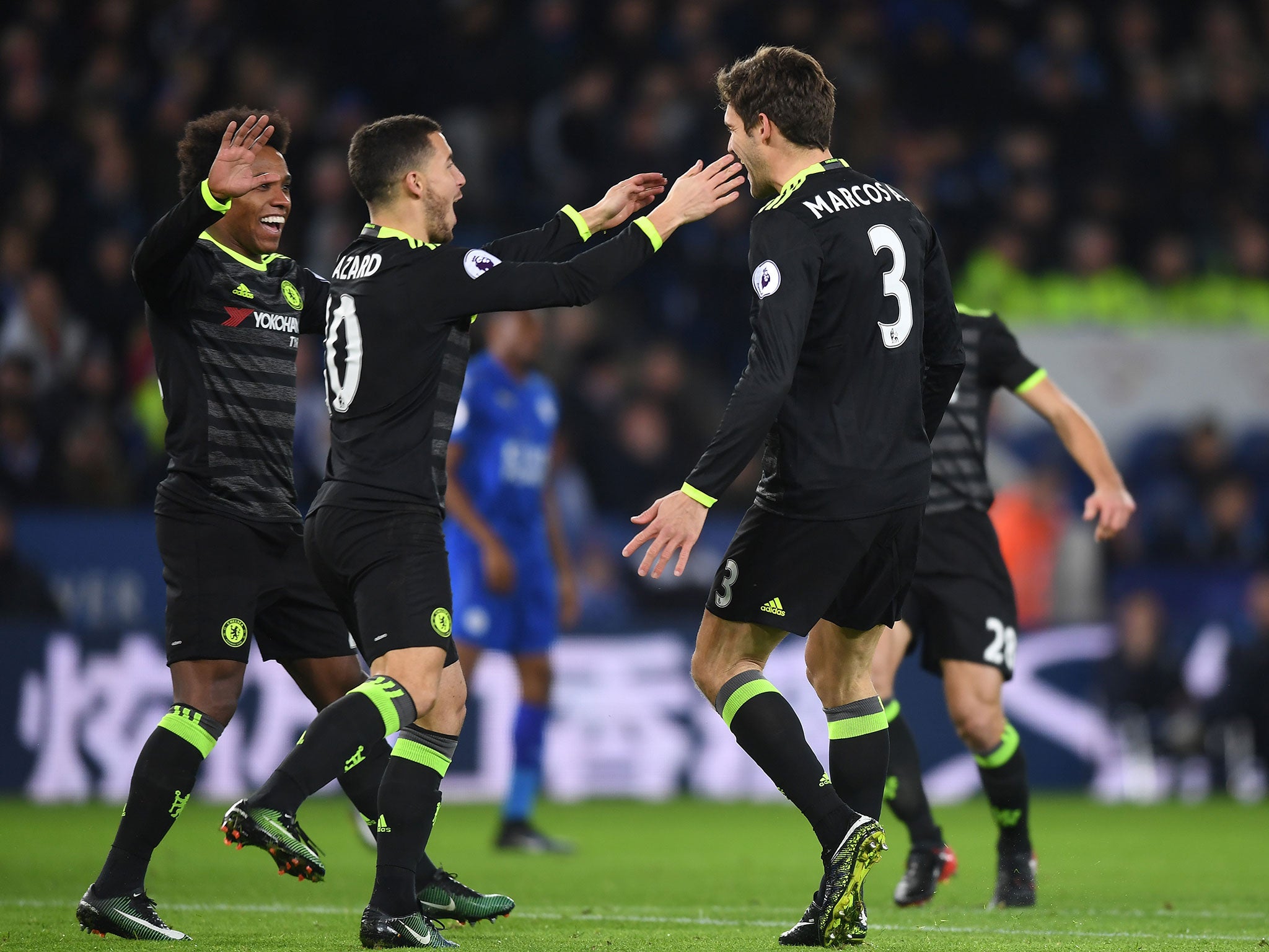 Chelsea players celebrate their early goal at the King Power Stadium