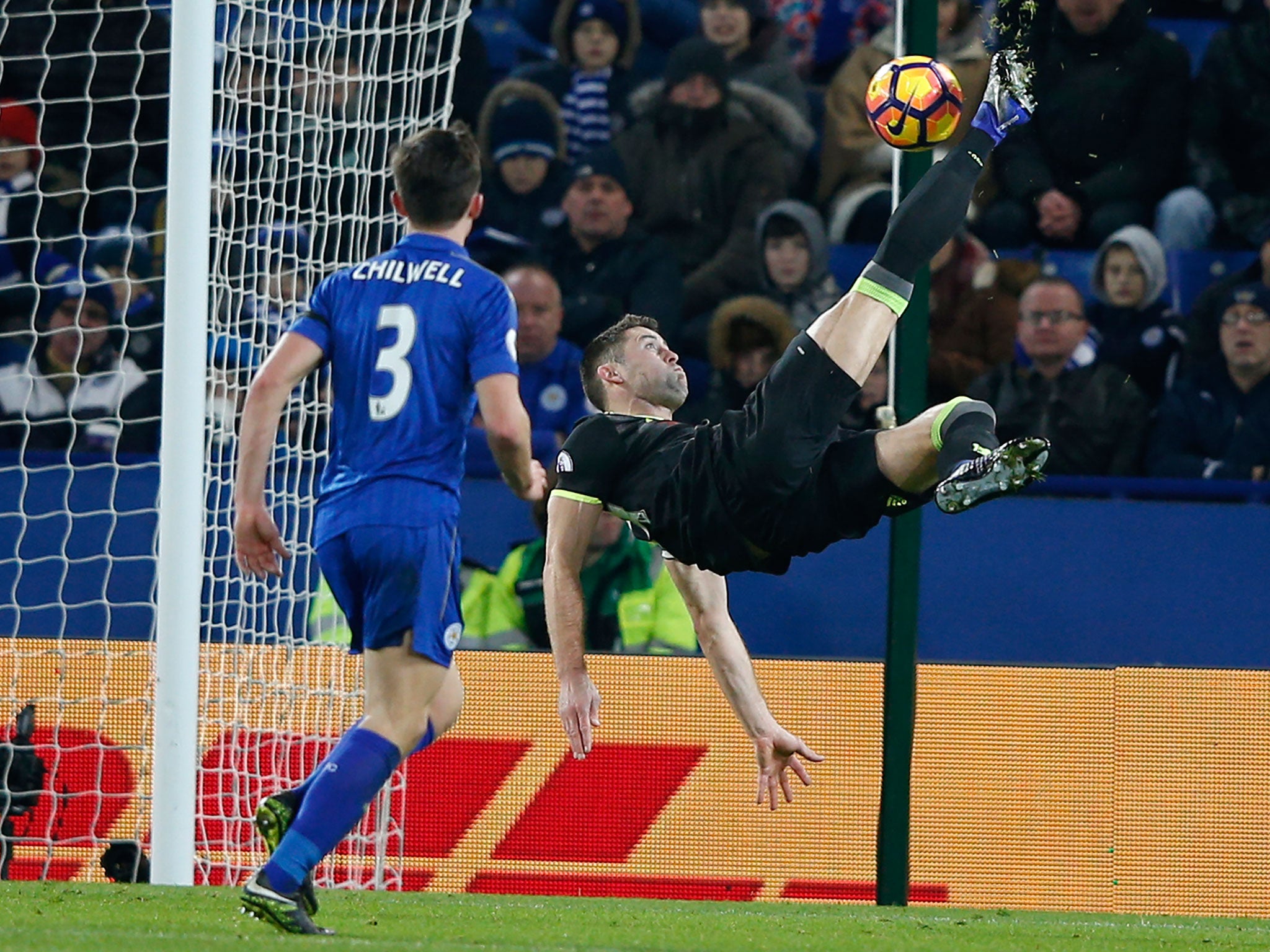 Cahill tries his luck on goal with an audacious bicycle kick