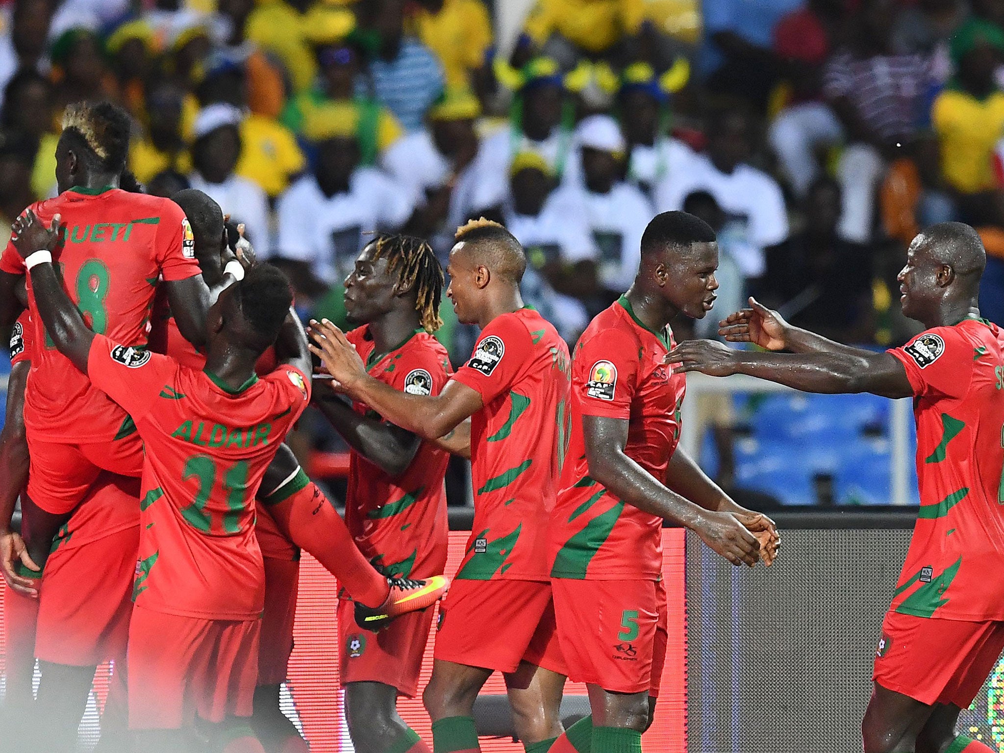 Guinea-Bissau's players celebrate after scoring against Gabon